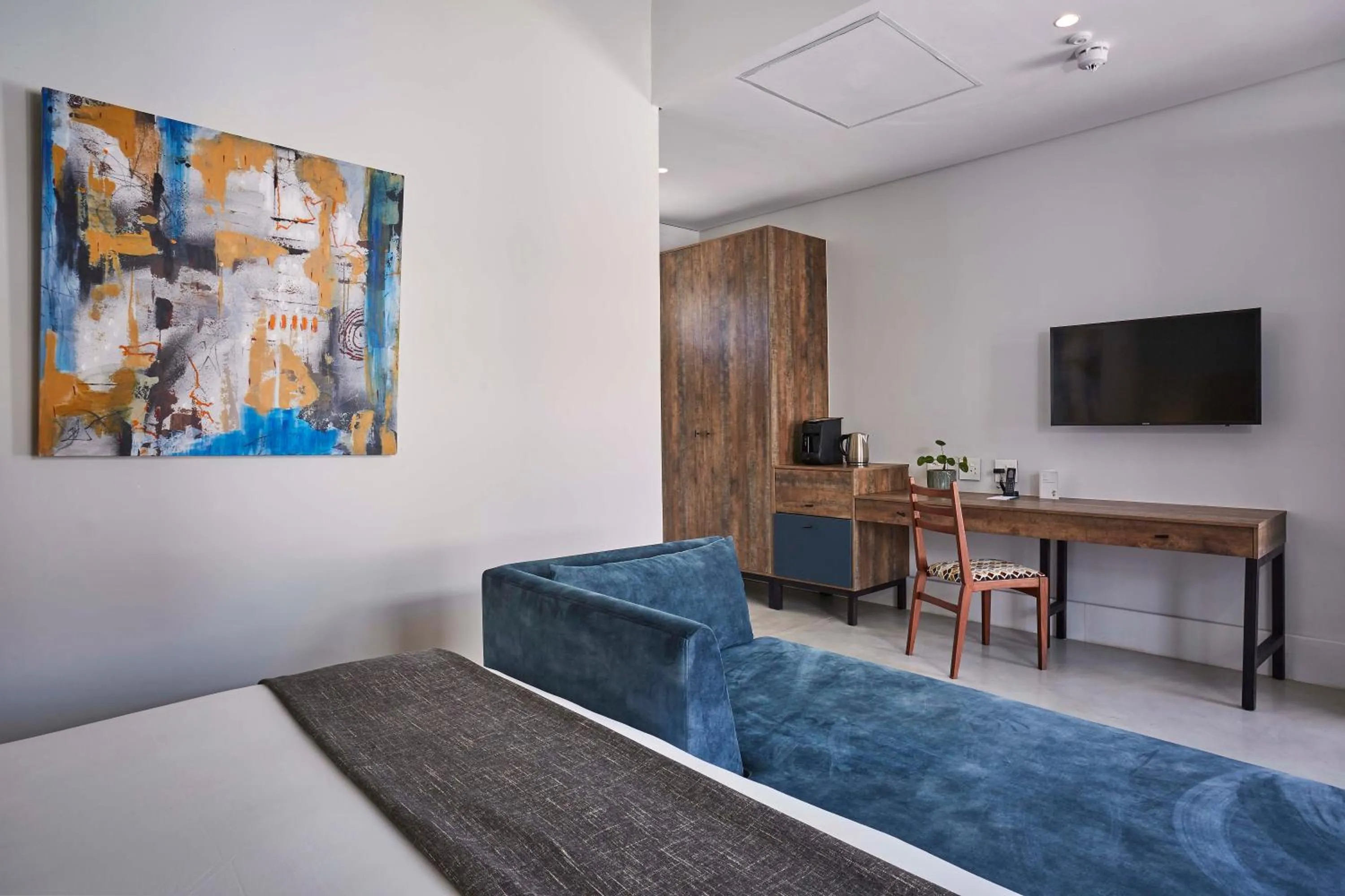 Bed in Chapter House Boutique Hotel by The Living Journey Collection