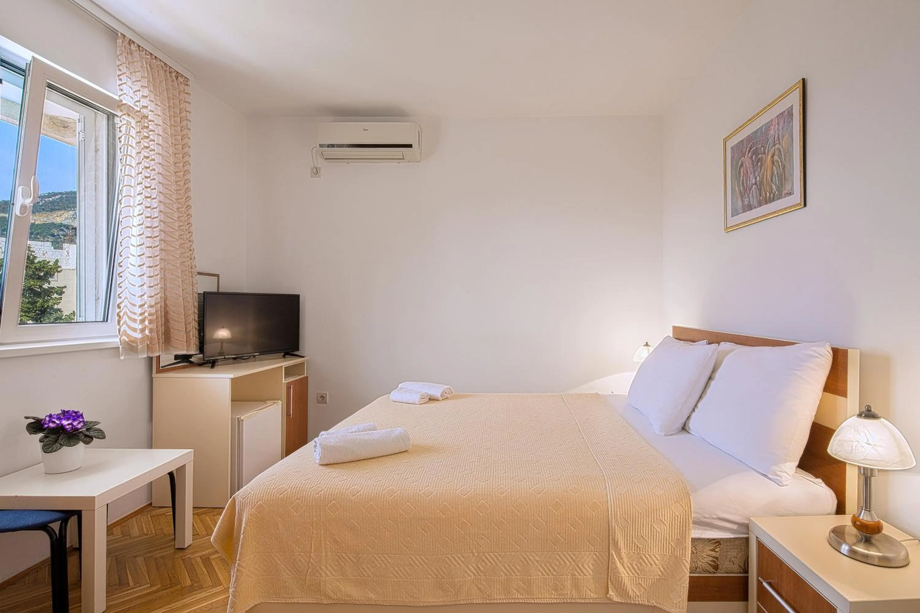Bed in Apartments Bloom Bečići