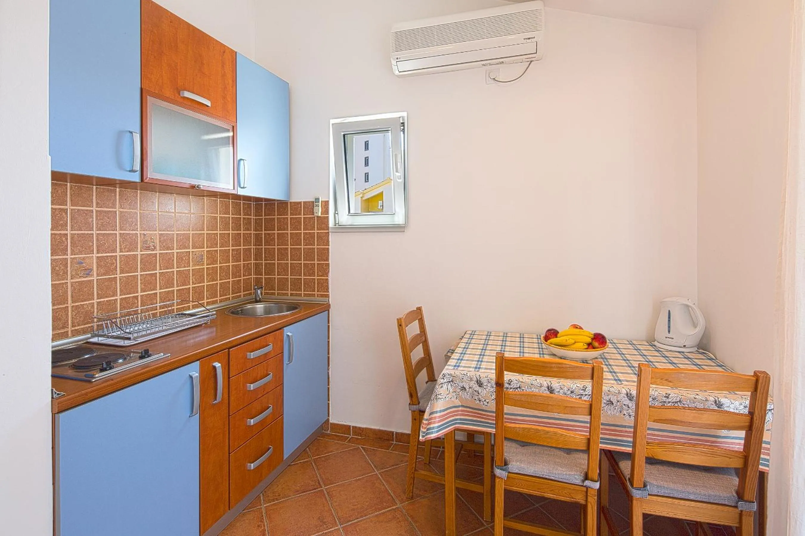 Kitchen or kitchenette in Apartments Bloom Bečići