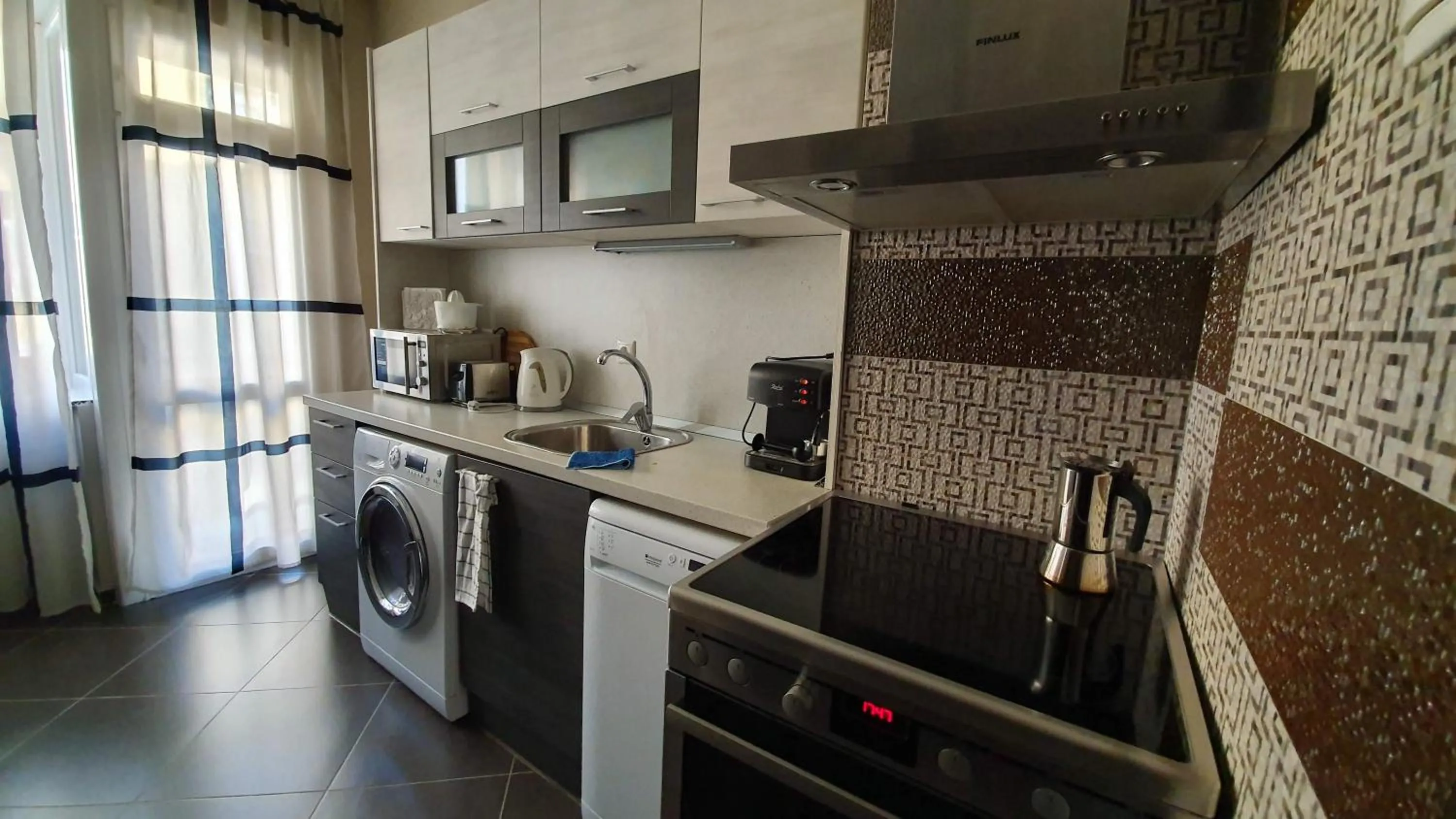 Kitchen or kitchenette in Starflat Quiet Parkside Suite