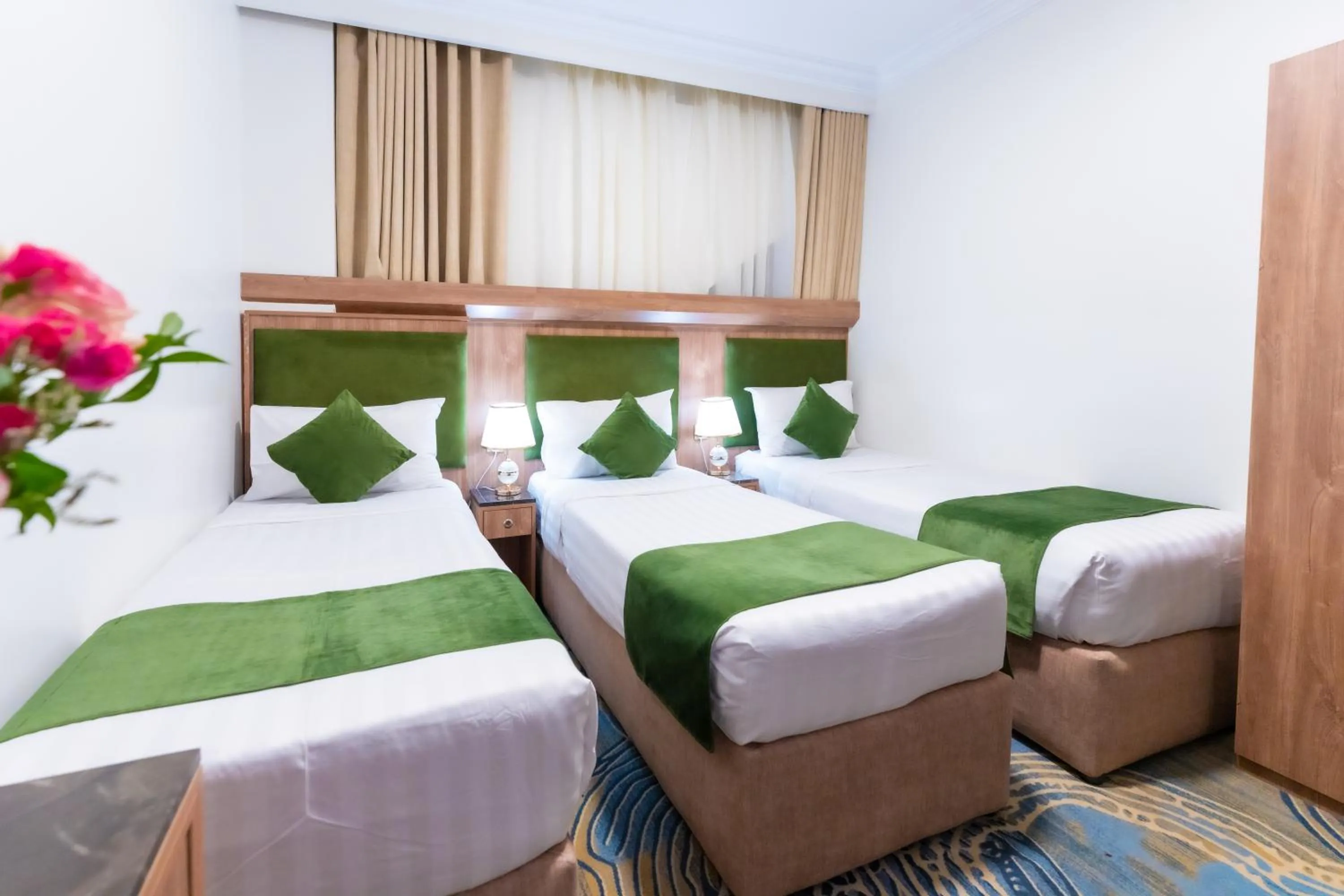 Bed in Hayah Plaza Hotel