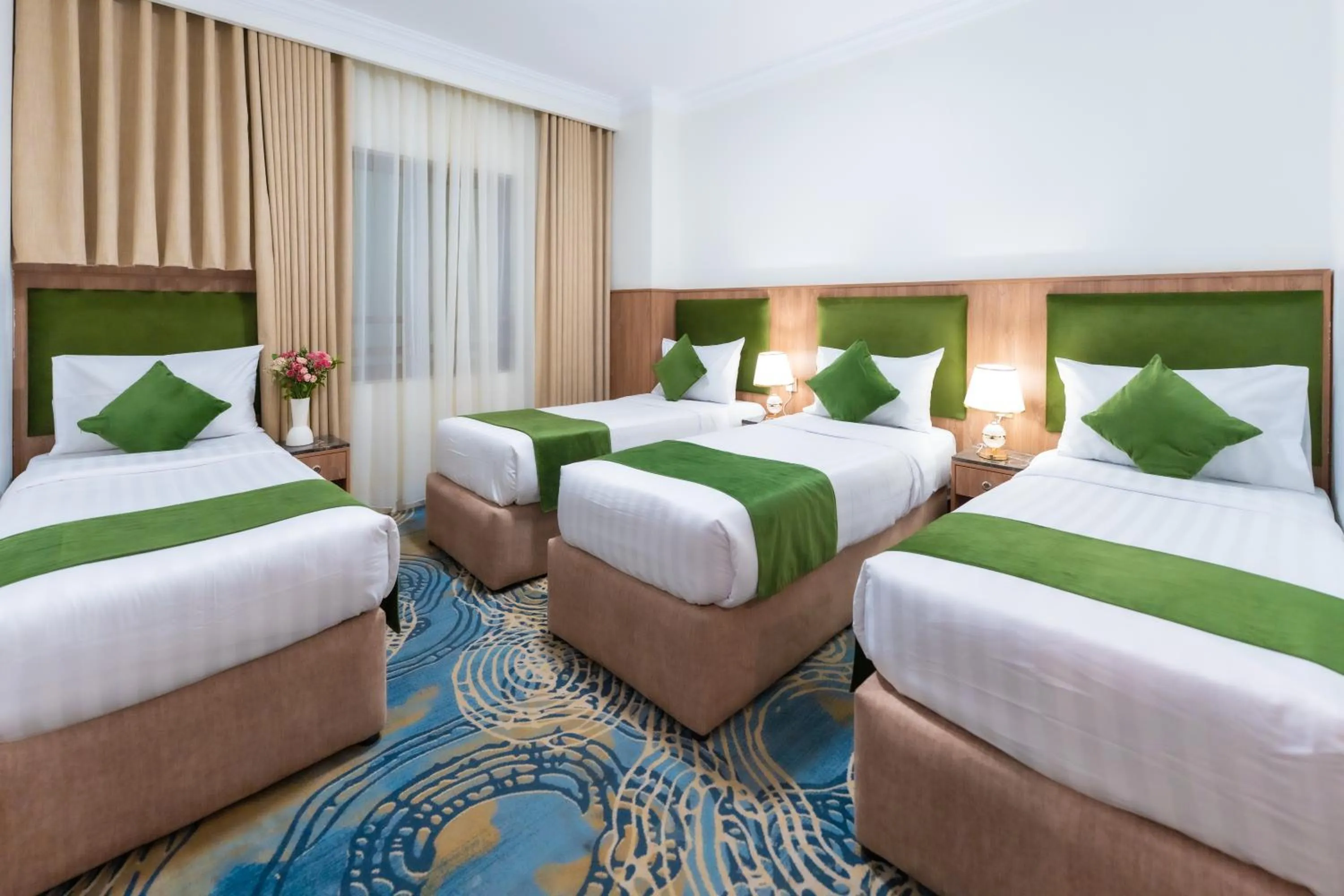 Bed in Hayah Plaza Hotel