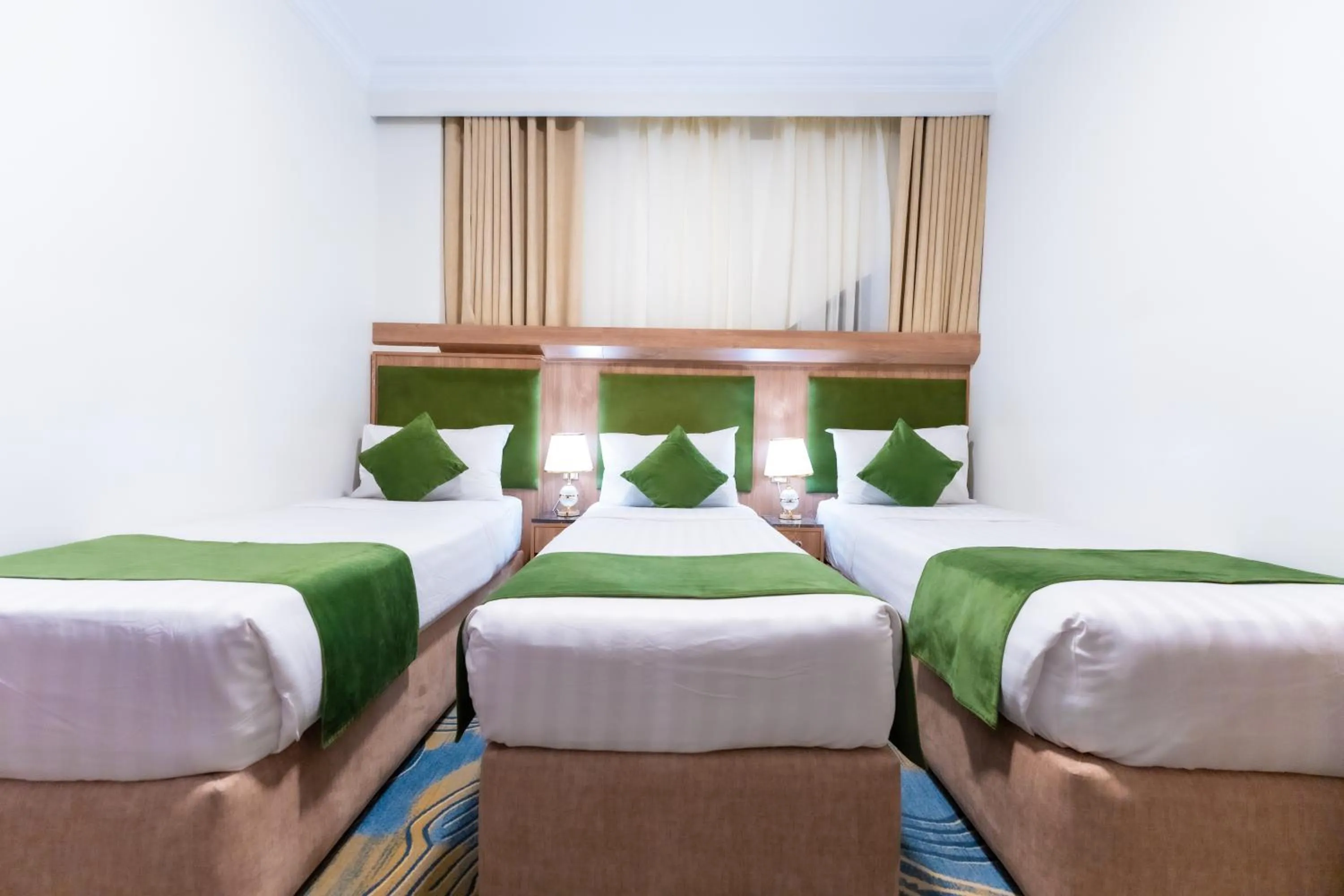 Bed in Hayah Plaza Hotel