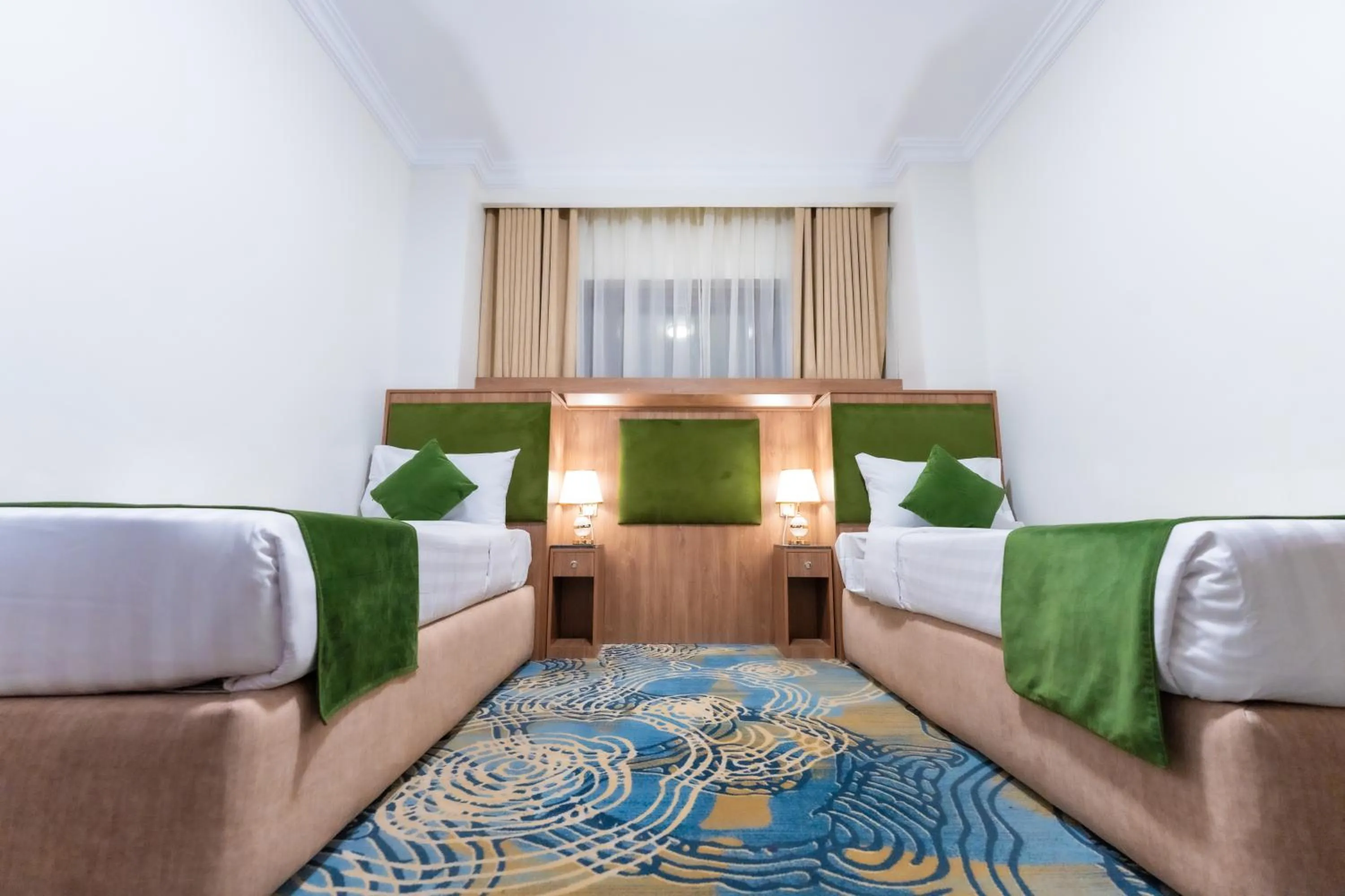 Bed in Hayah Plaza Hotel