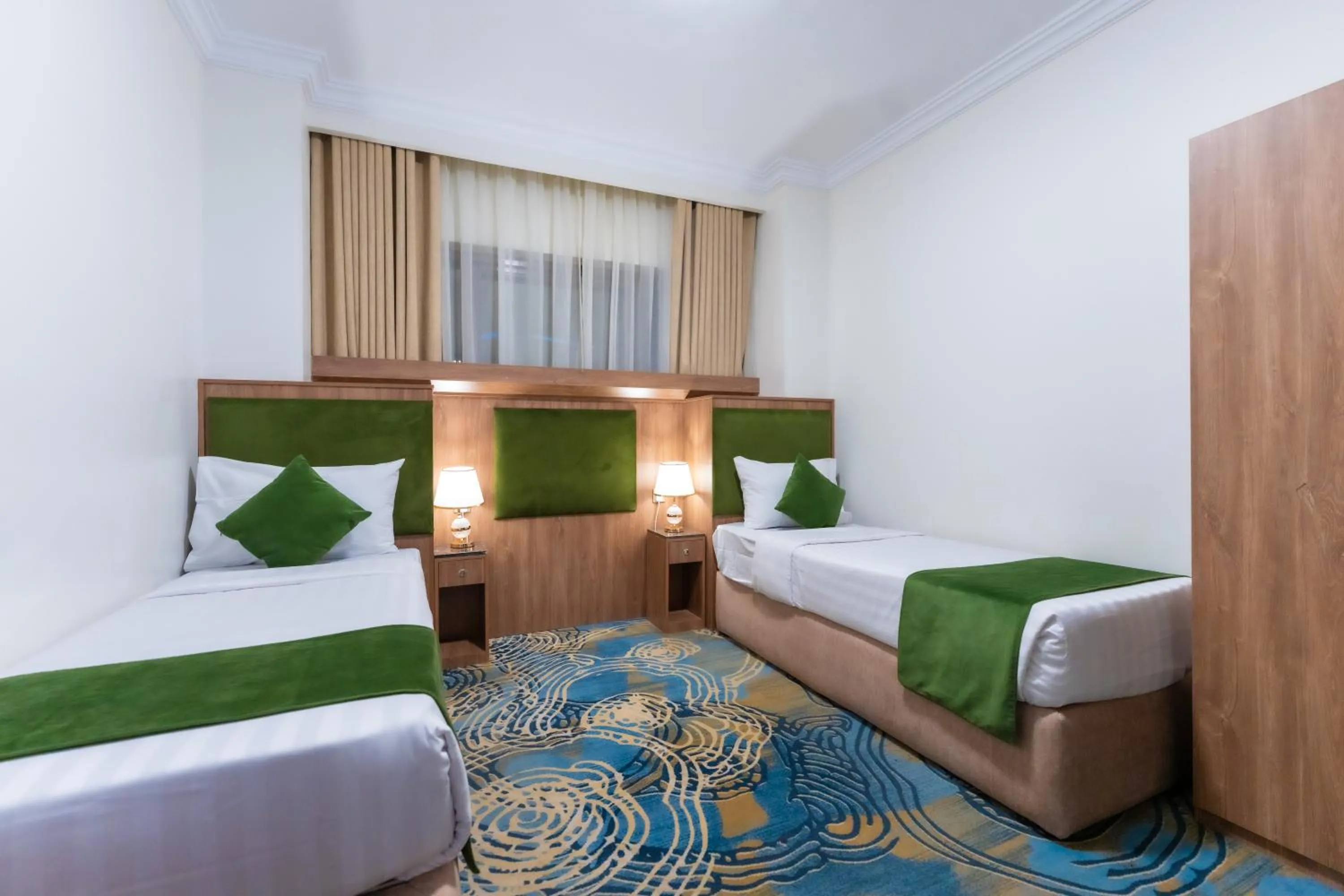 Bed in Hayah Plaza Hotel