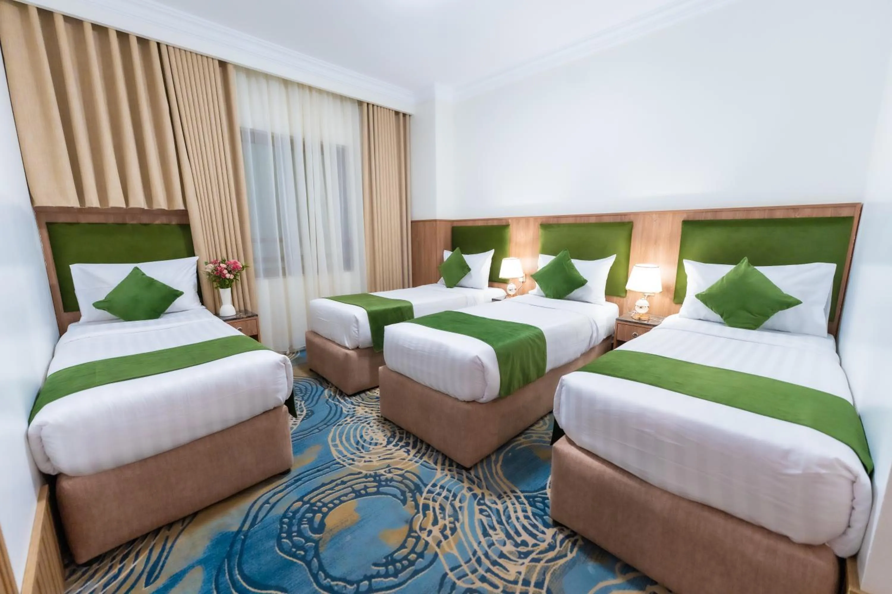 Bed in Hayah Plaza Hotel