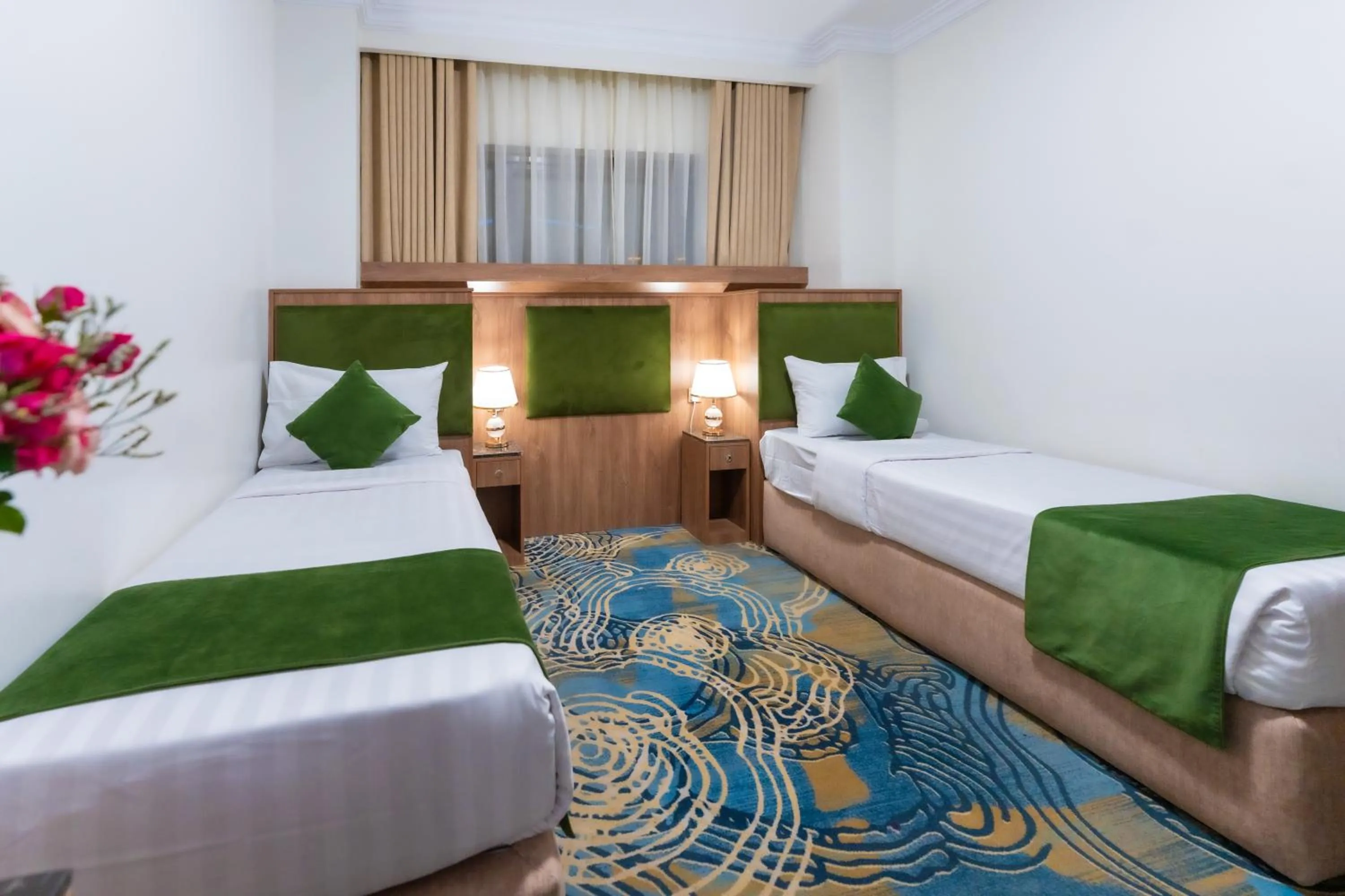 Bed in Hayah Plaza Hotel