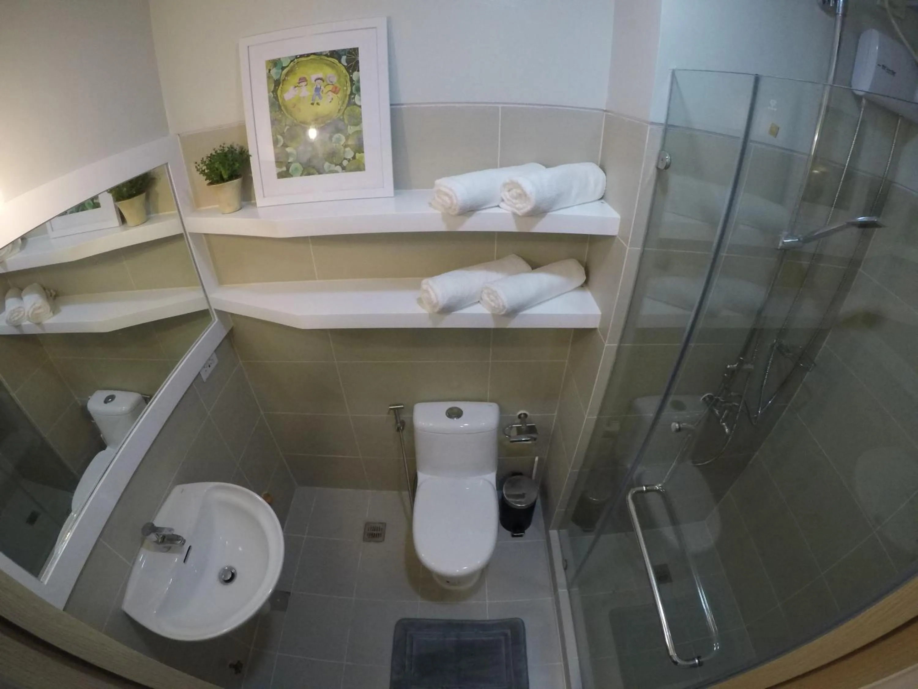 Bathroom in Cozy Family Suite with Stunning View of Taal