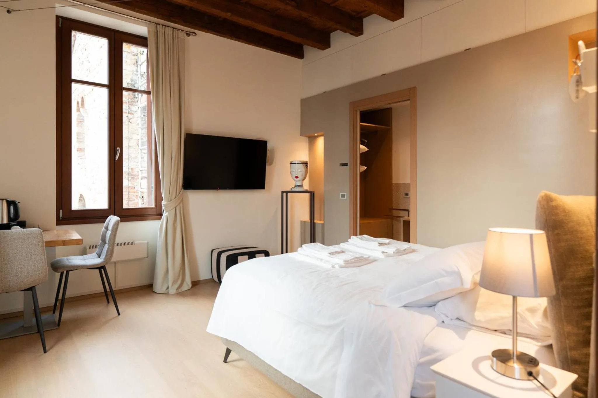 Bed in La finestra sul Ponte by Postcardsfrom