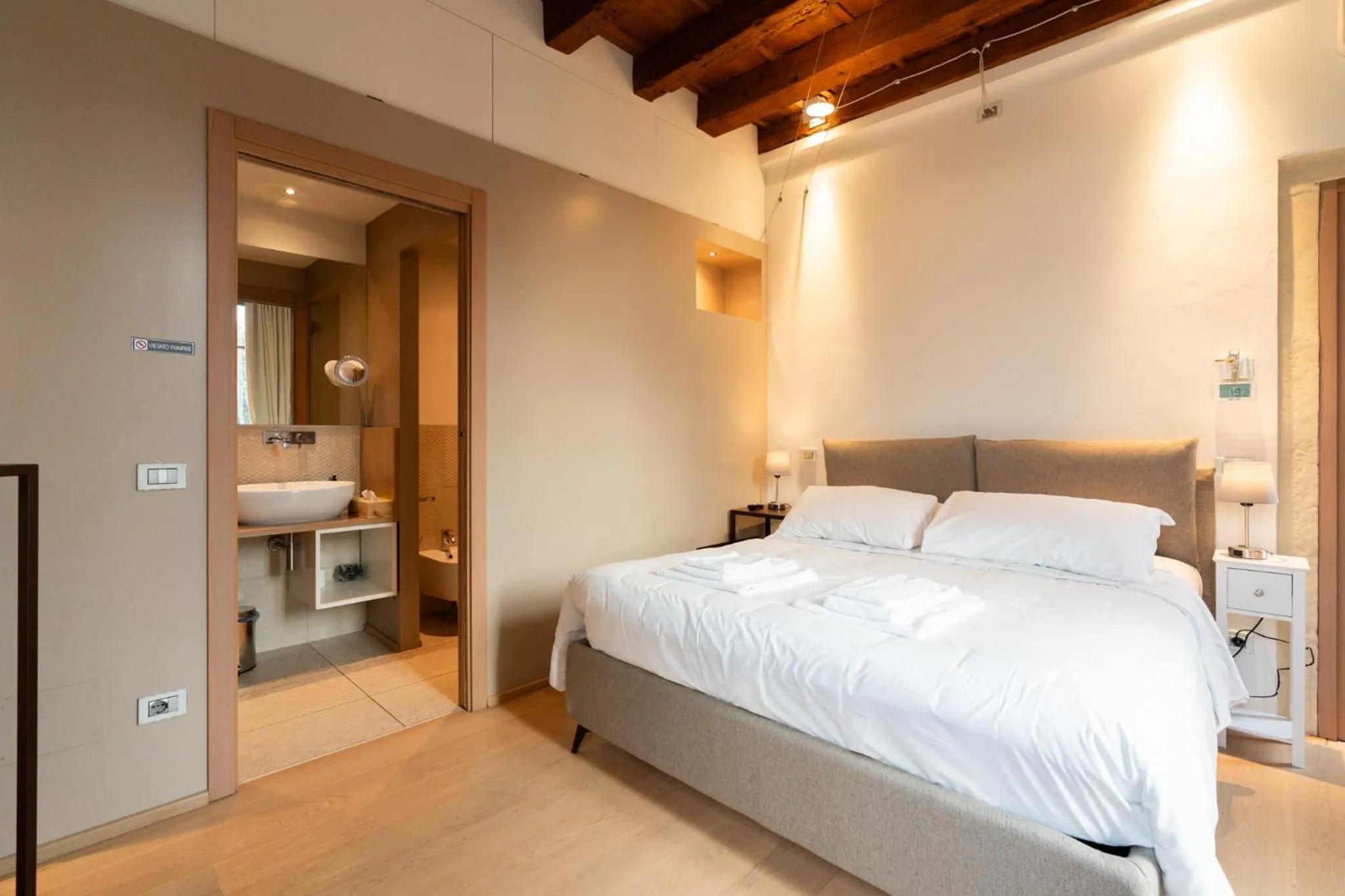 Bed in La finestra sul Ponte by Postcardsfrom