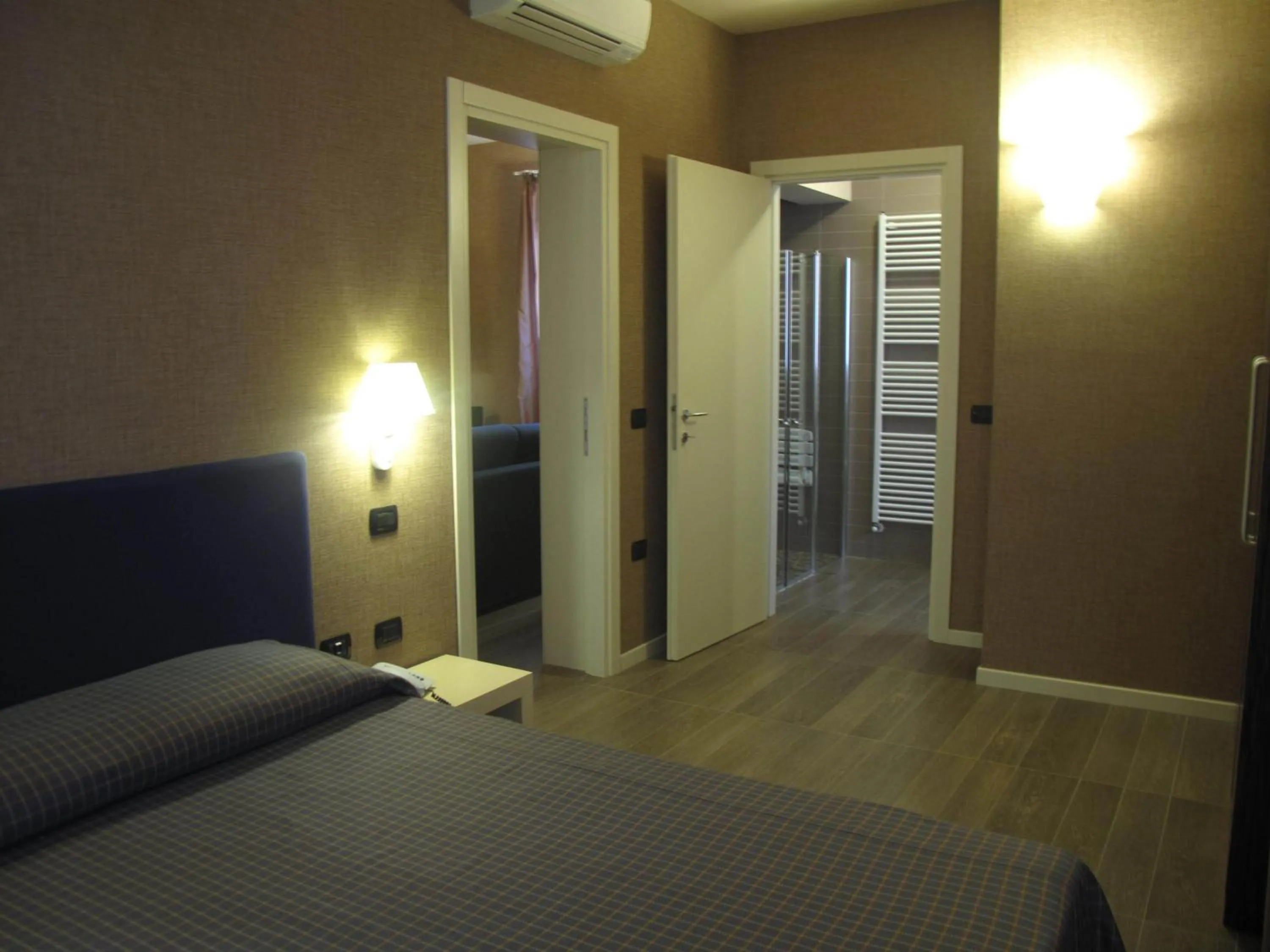 Bed in Hotel Locanda Stendhal