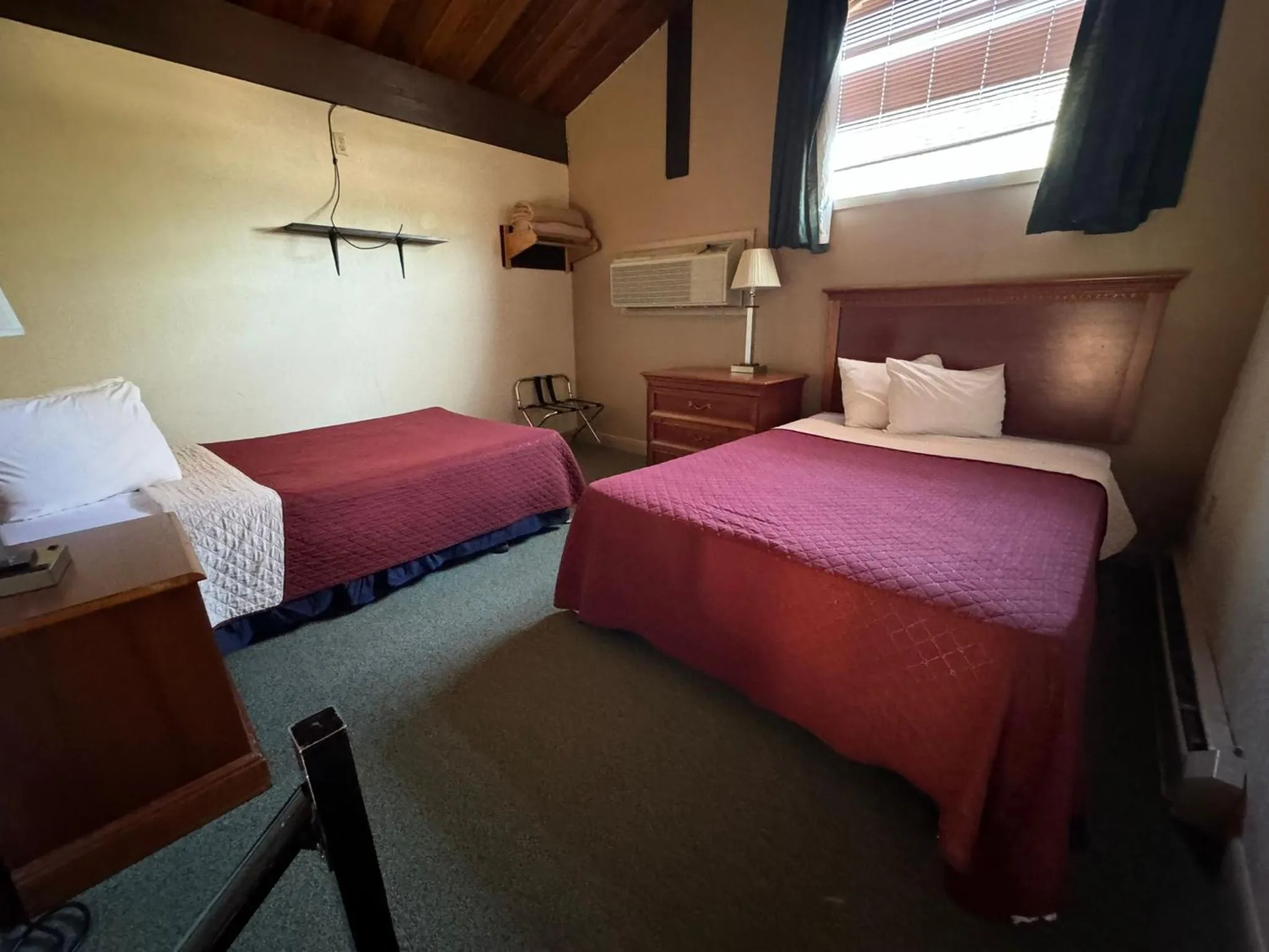 Bed in FairBridge Inn and Suites West Point