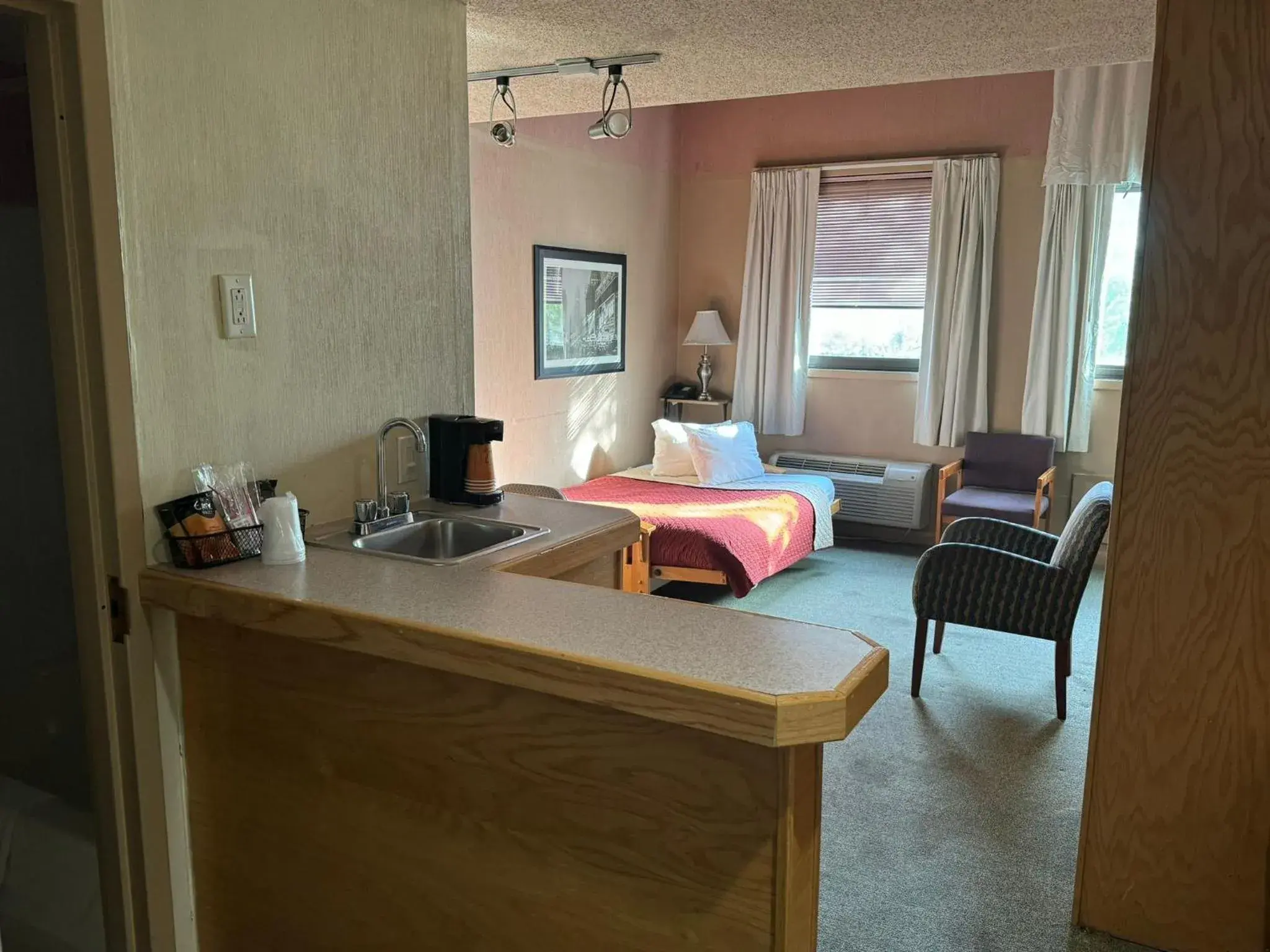 Bed in FairBridge Inn and Suites West Point Bed in FairBridge Inn and Suites West Point