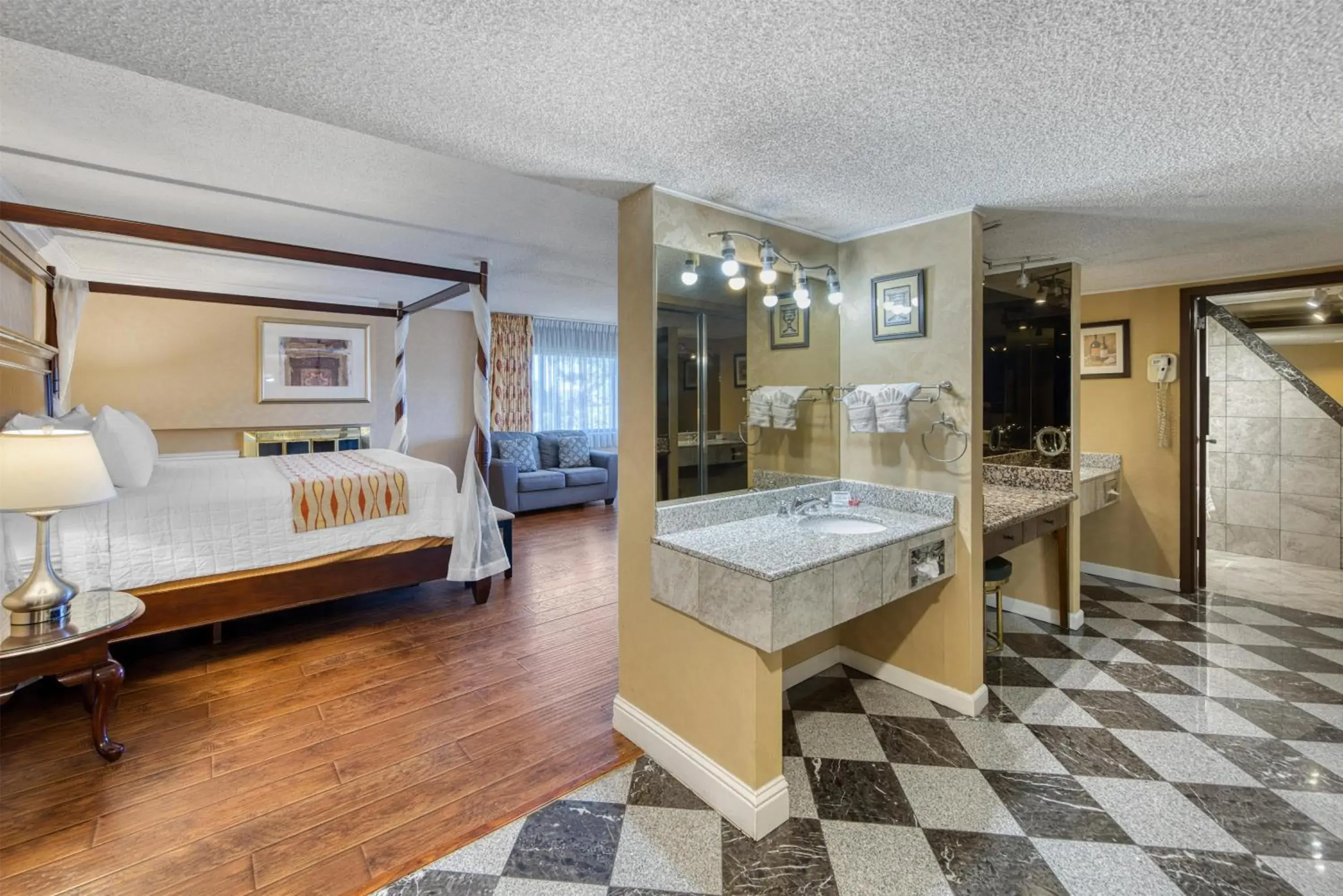 Bathroom in SureStay Plus Hotel by Best Western Reno Airport Bathroom in SureStay Plus Hotel by Best Western Reno Airport