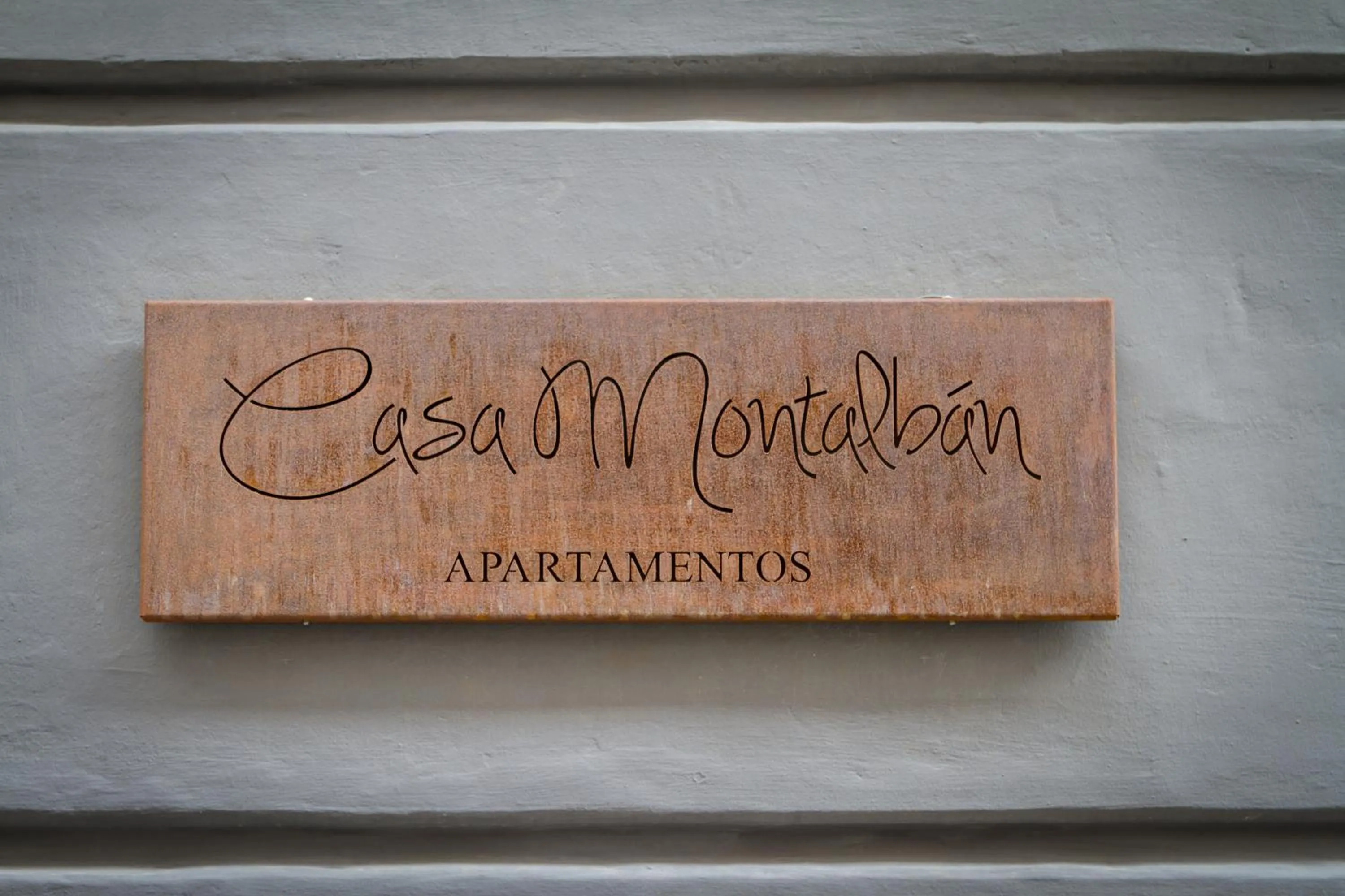 Property logo or sign in Casa Montalbán Apartamentos Turísticos