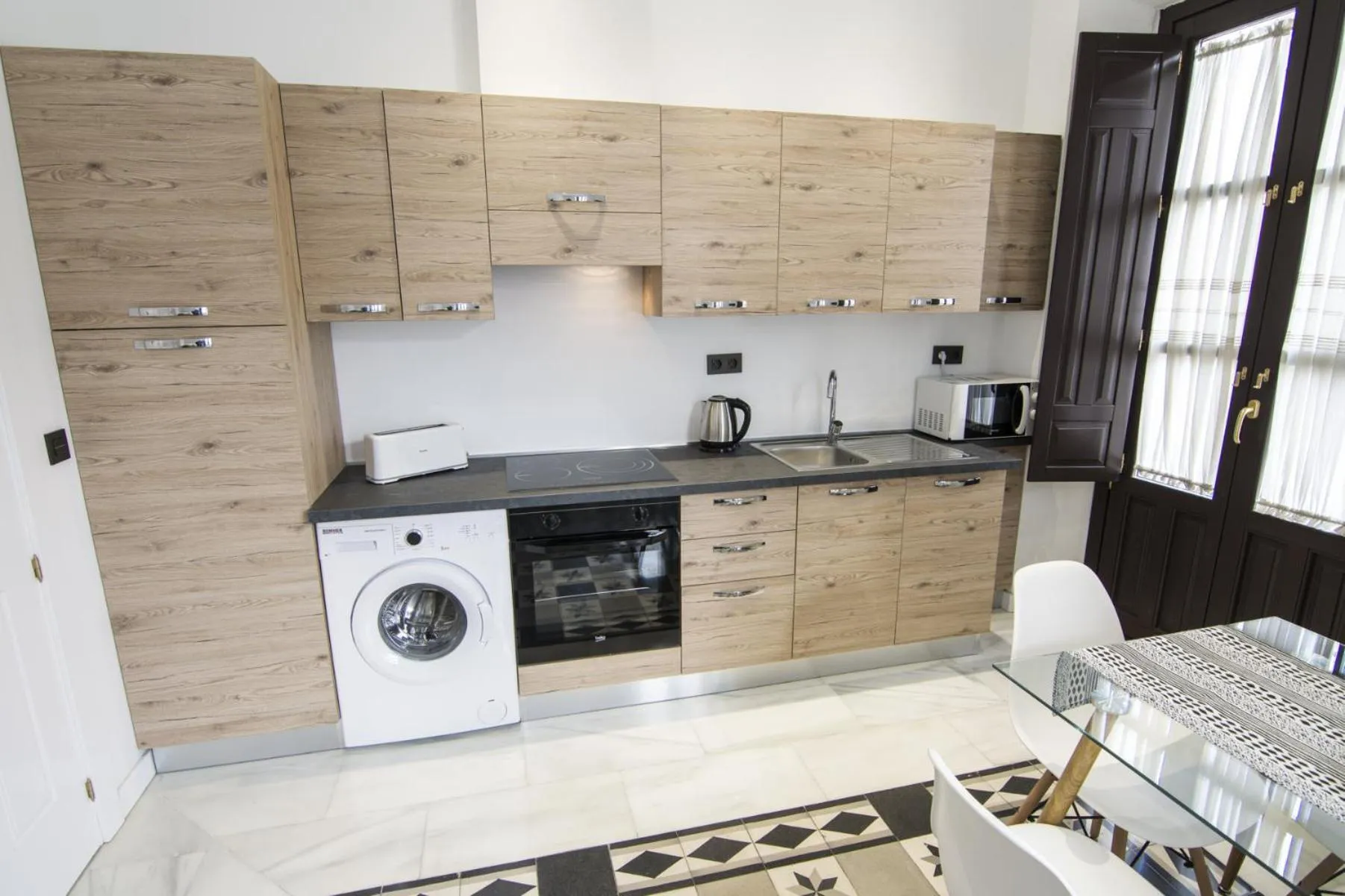 Kitchen or kitchenette in Casa Montalbán Apartamentos Turísticos