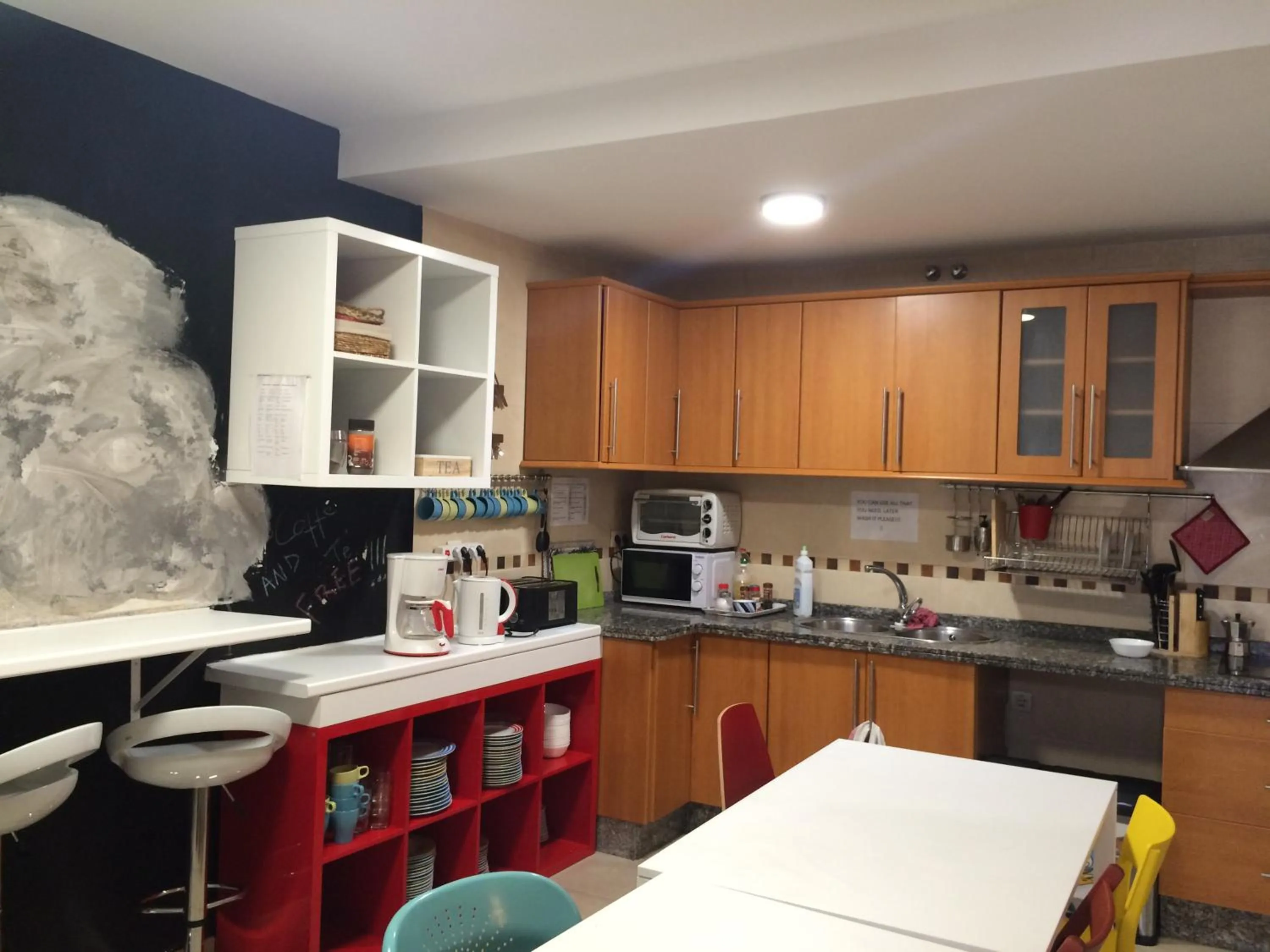 Communal kitchen in Oh! My Hostel