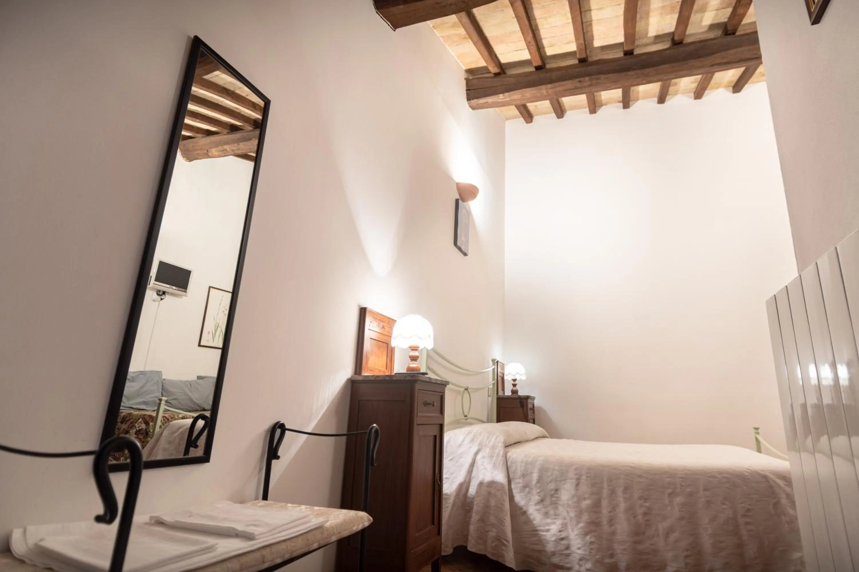 Photo of the whole room, Bed in Agriturismo Sasso Rosso