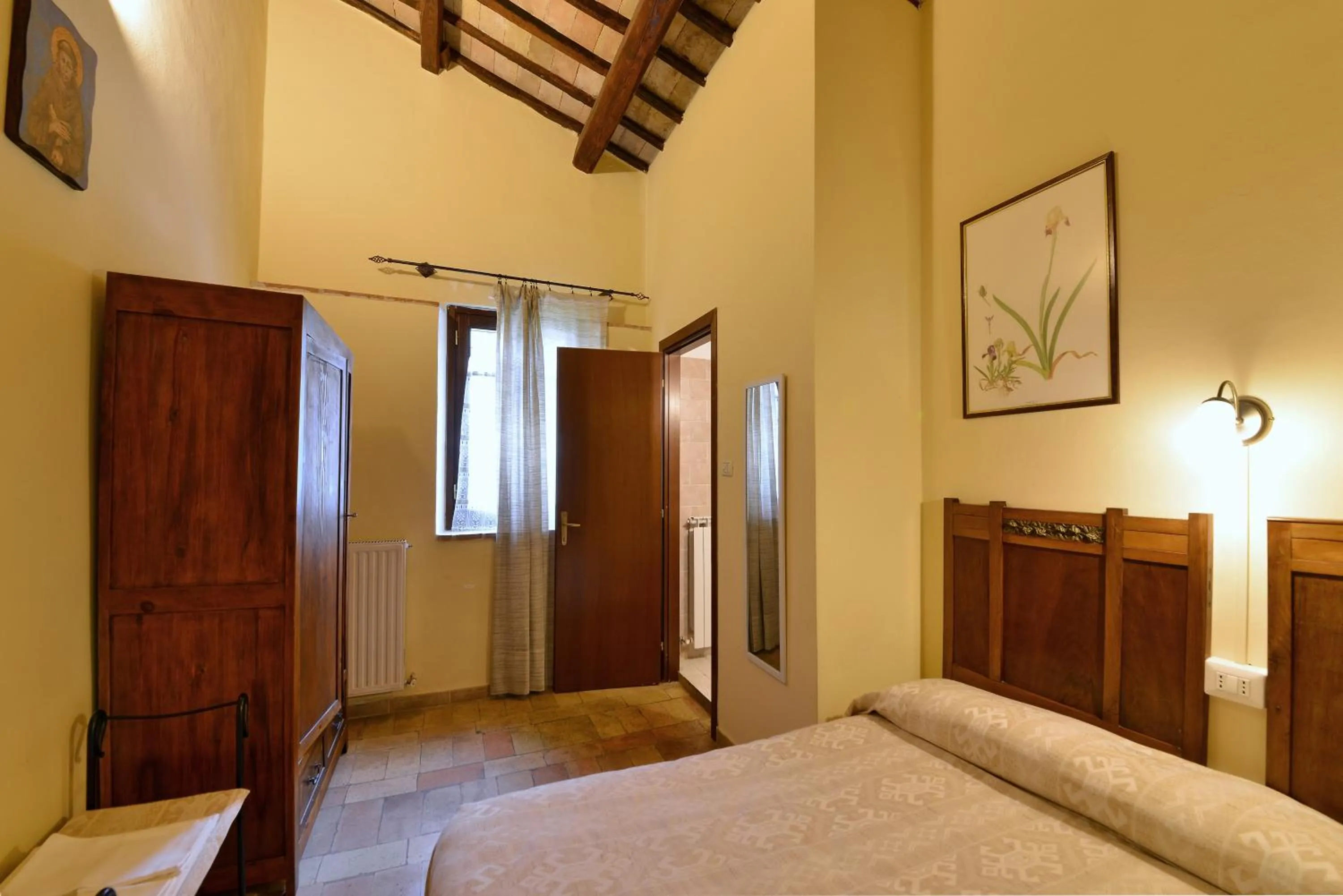 Photo of the whole room, Bed in Agriturismo Sasso Rosso
