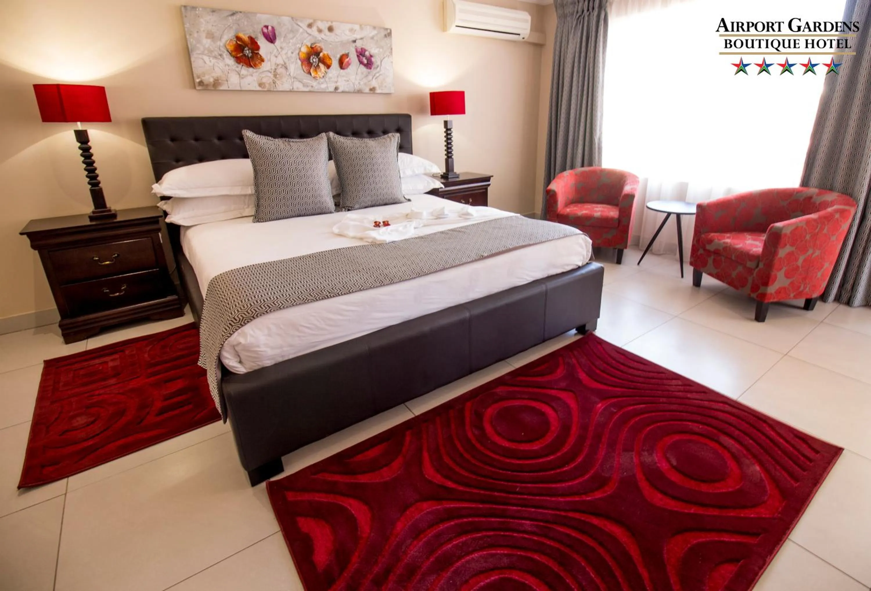 Photo of the whole room, Bed in Airport Gardens Boutique Hotel