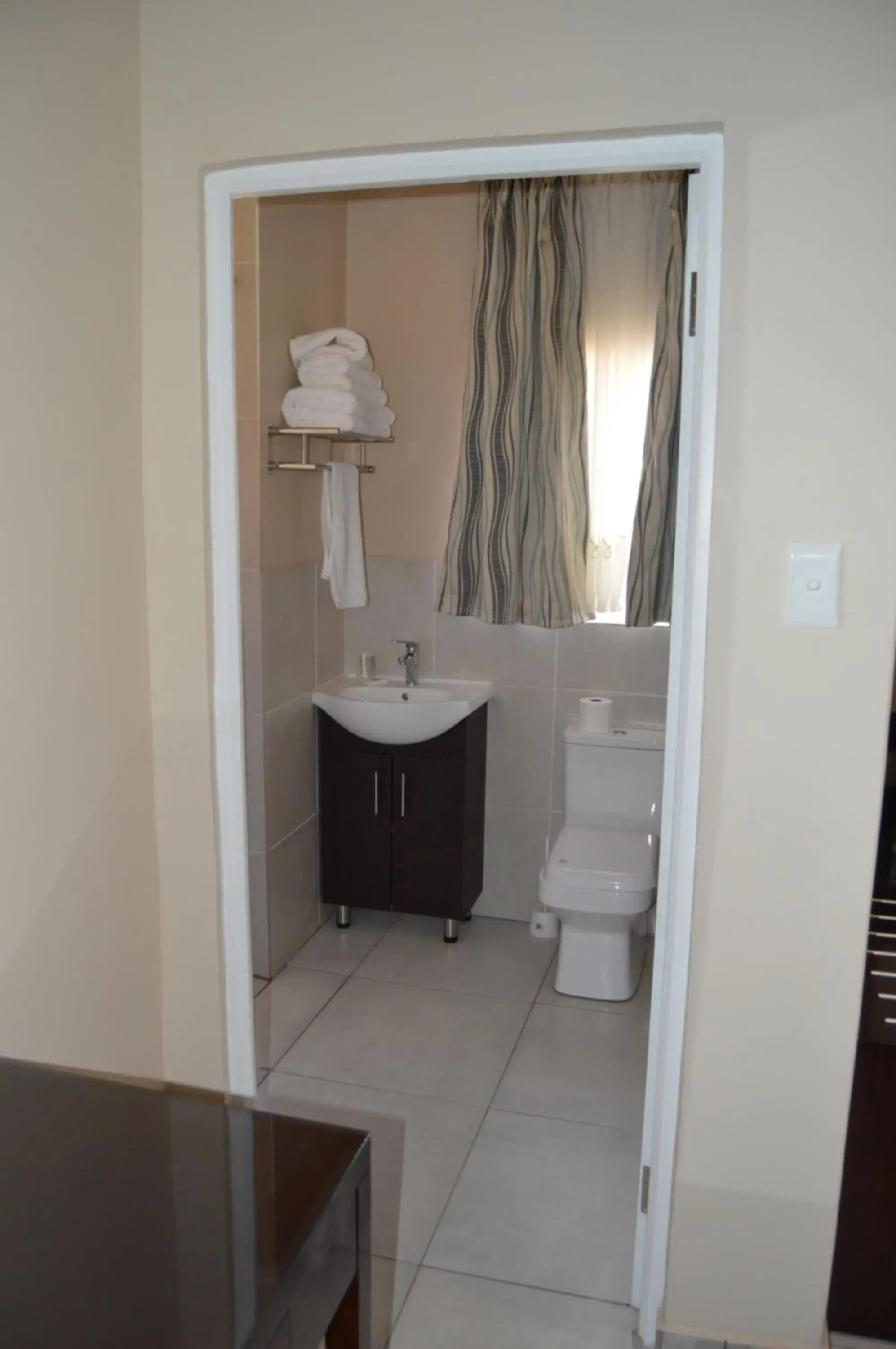 Bathroom in Airport Gardens Boutique Hotel Bathroom in Airport Gardens Boutique Hotel