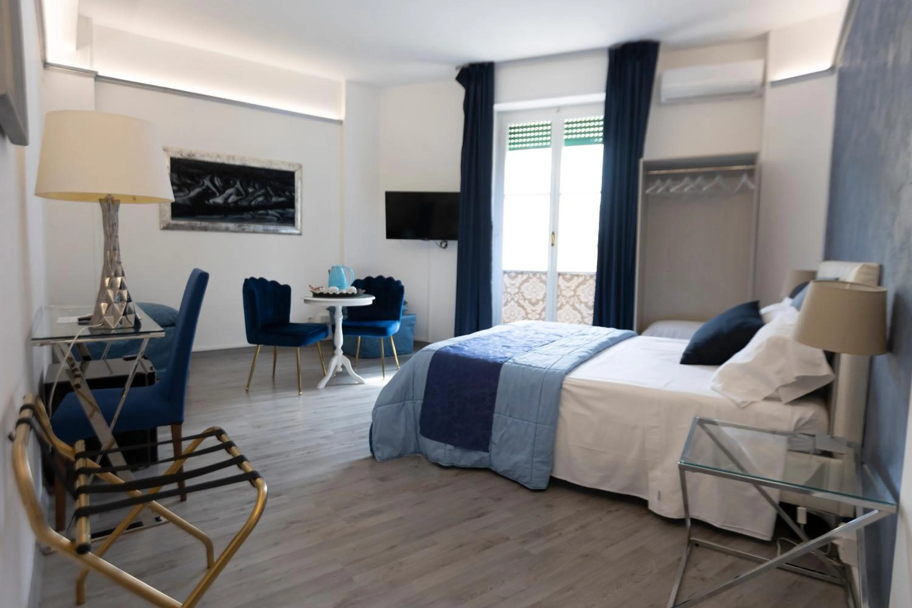 Photo of the whole room, Bed in Soggiorno La Coccinella