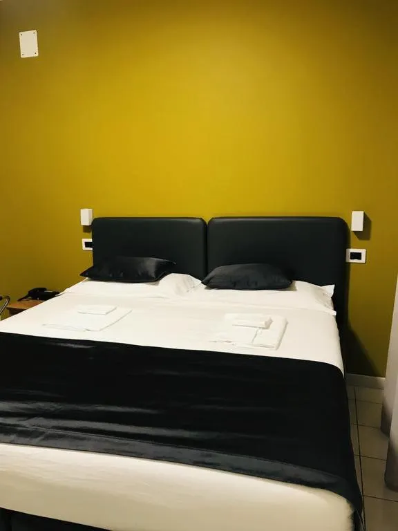 Bed in Hotel Mediterraneo