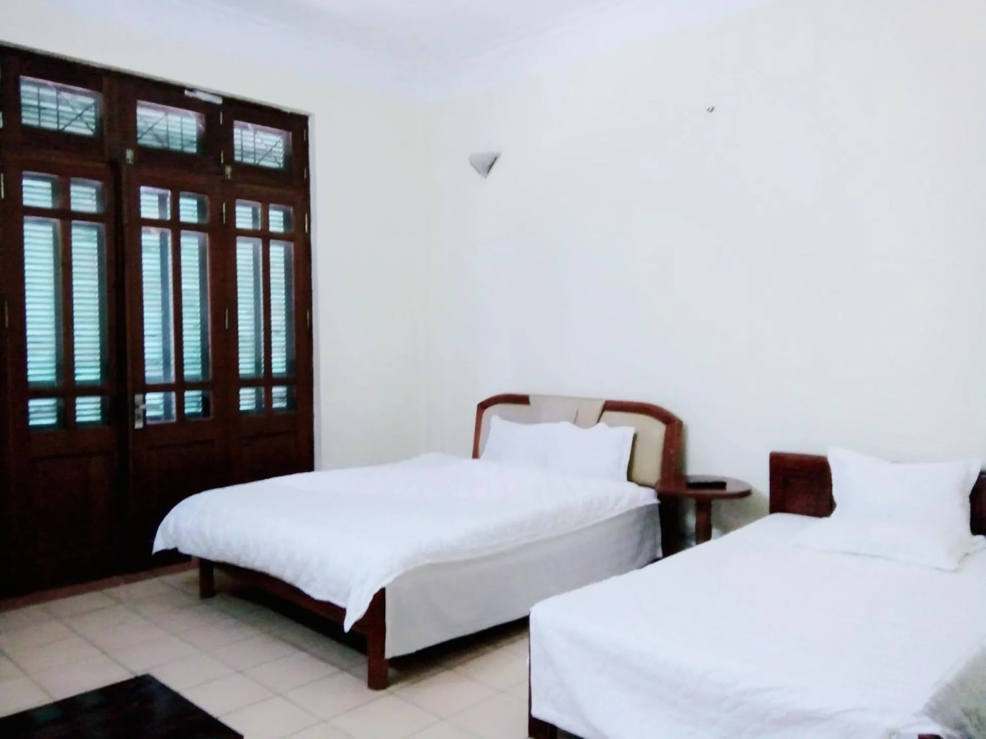 Bed in Ngoc Son Tam Dao Hotel