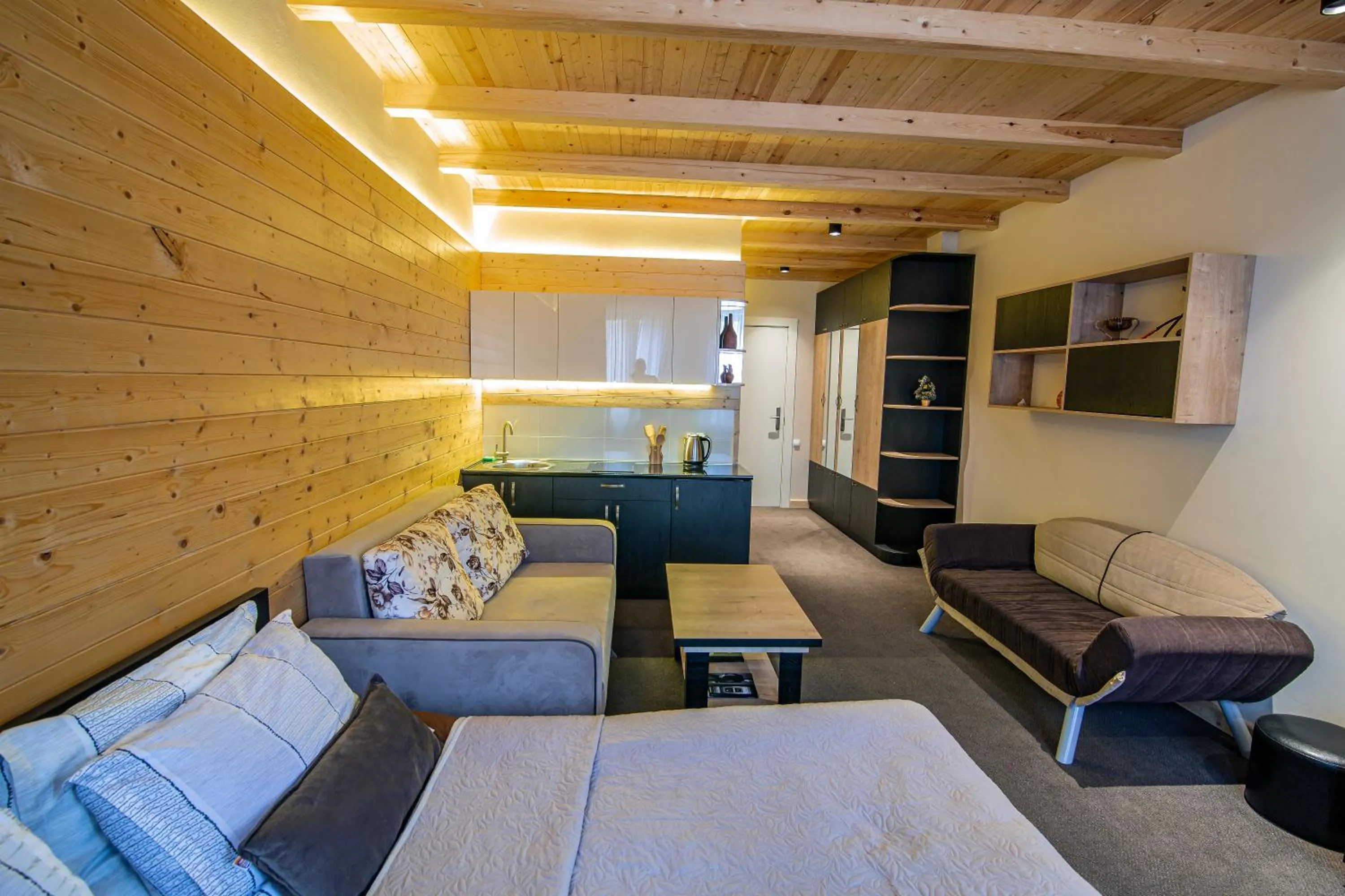 Living room, Bed in Room225 - New Gudauri Suites
