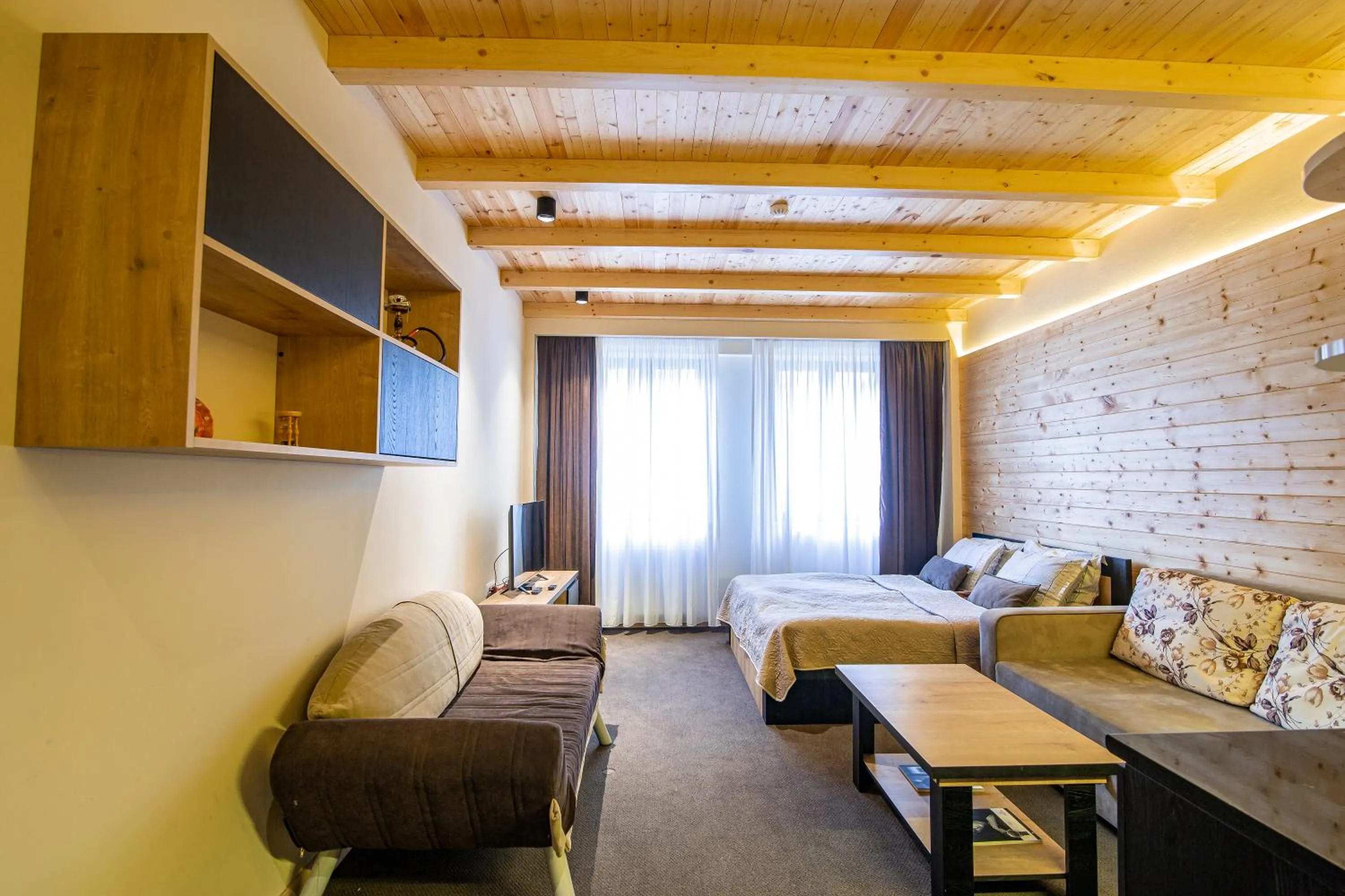 Living room, Bed in Room225 - New Gudauri Suites