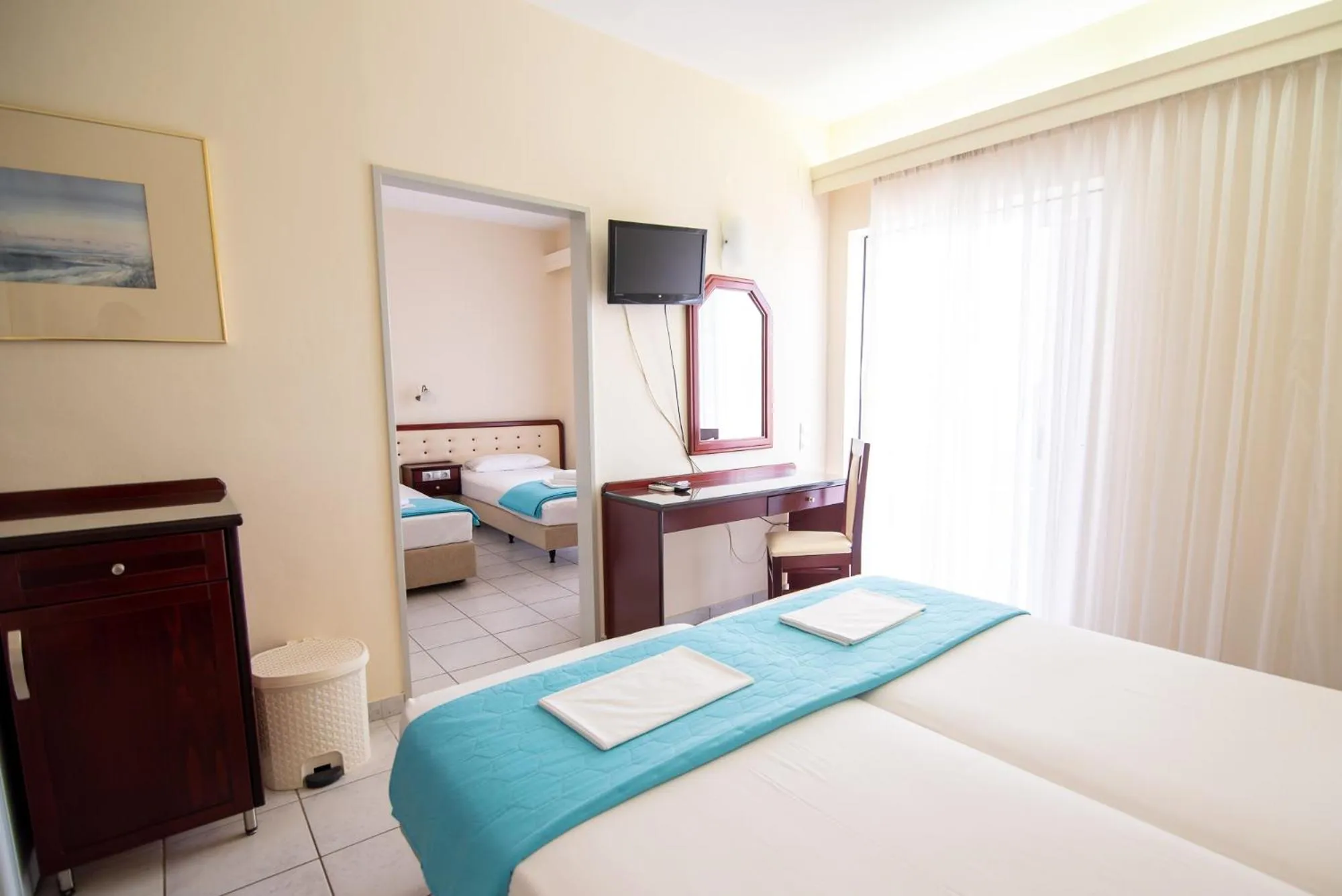 Bed in Dionisos Hotel