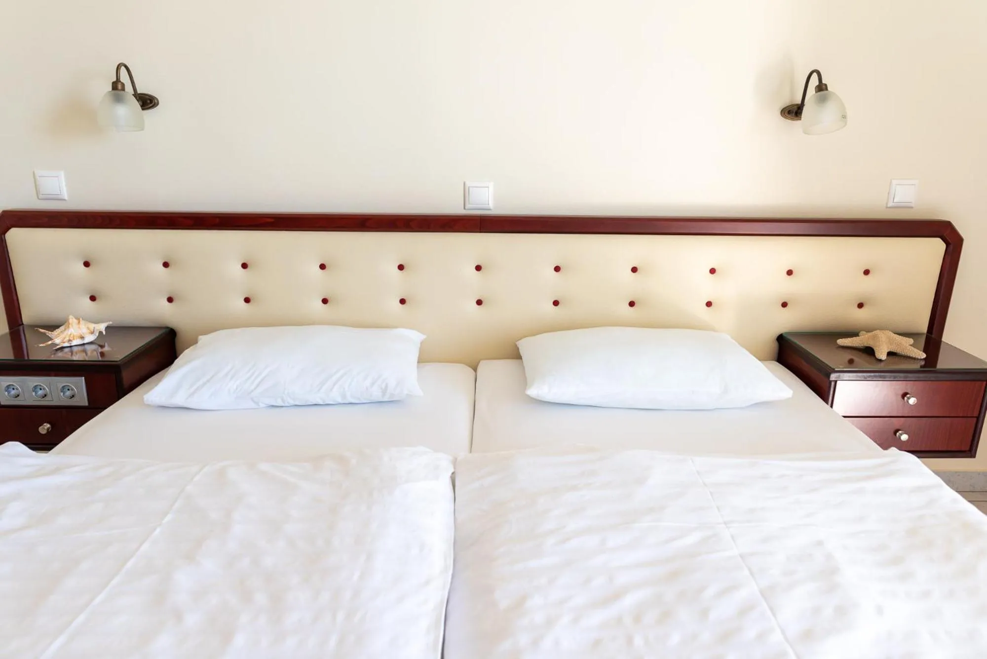 Bed in Dionisos Hotel