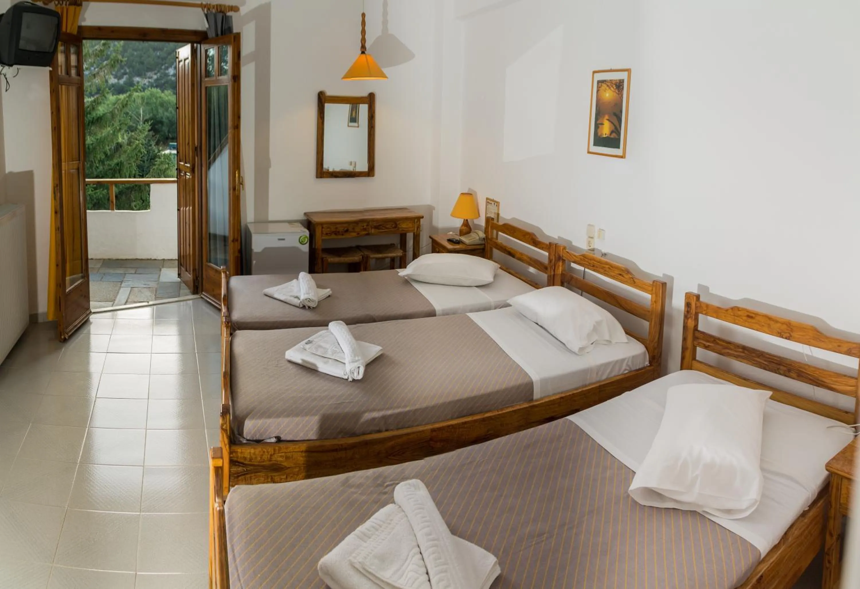 Photo of the whole room, Bed in Neos Omalos Hotel