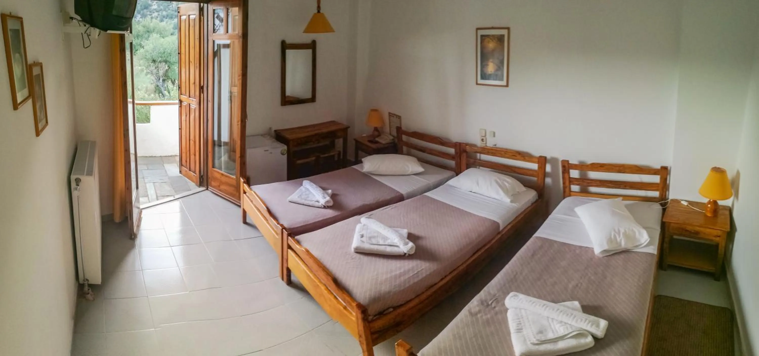 Garden view, Bed in Neos Omalos Hotel