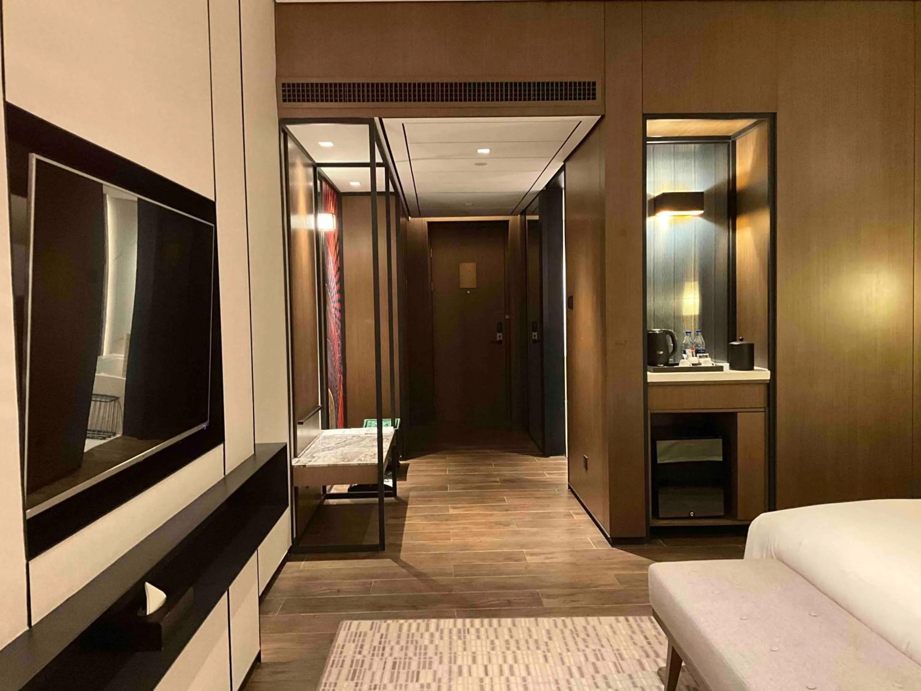 Facade/entrance, Bed in Wyndham Grand Yangon