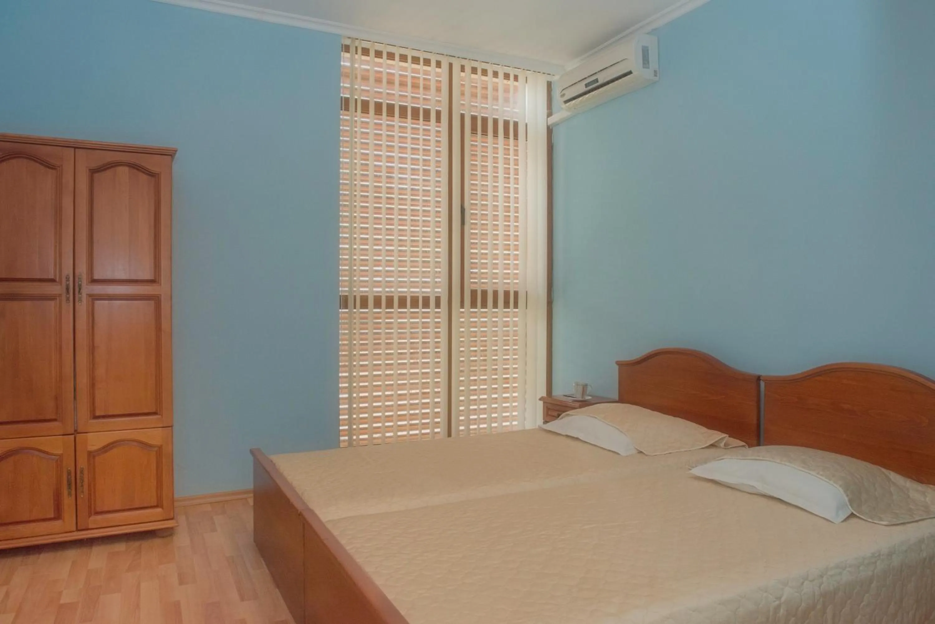 Bed in Sun City I Apartments