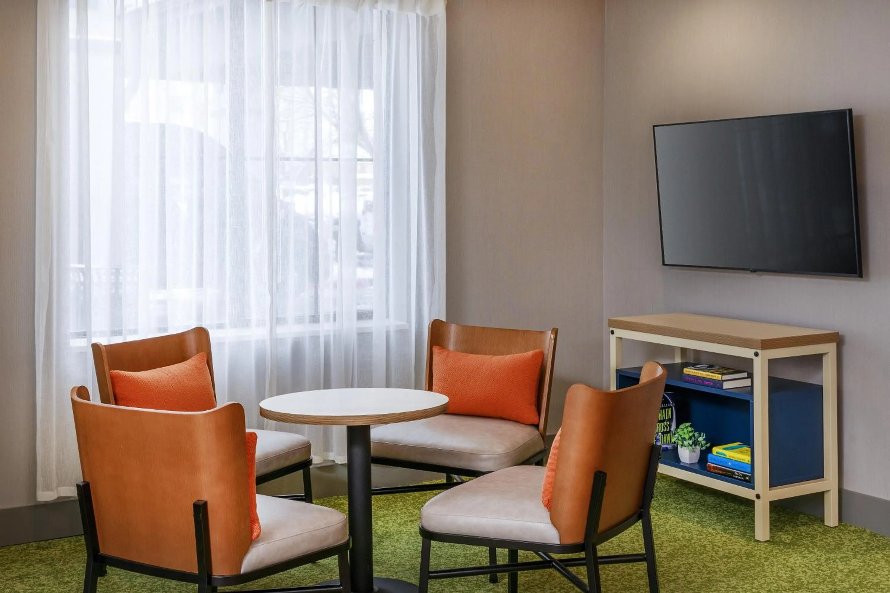 Seating area in Spark by Hilton Denver International Airport