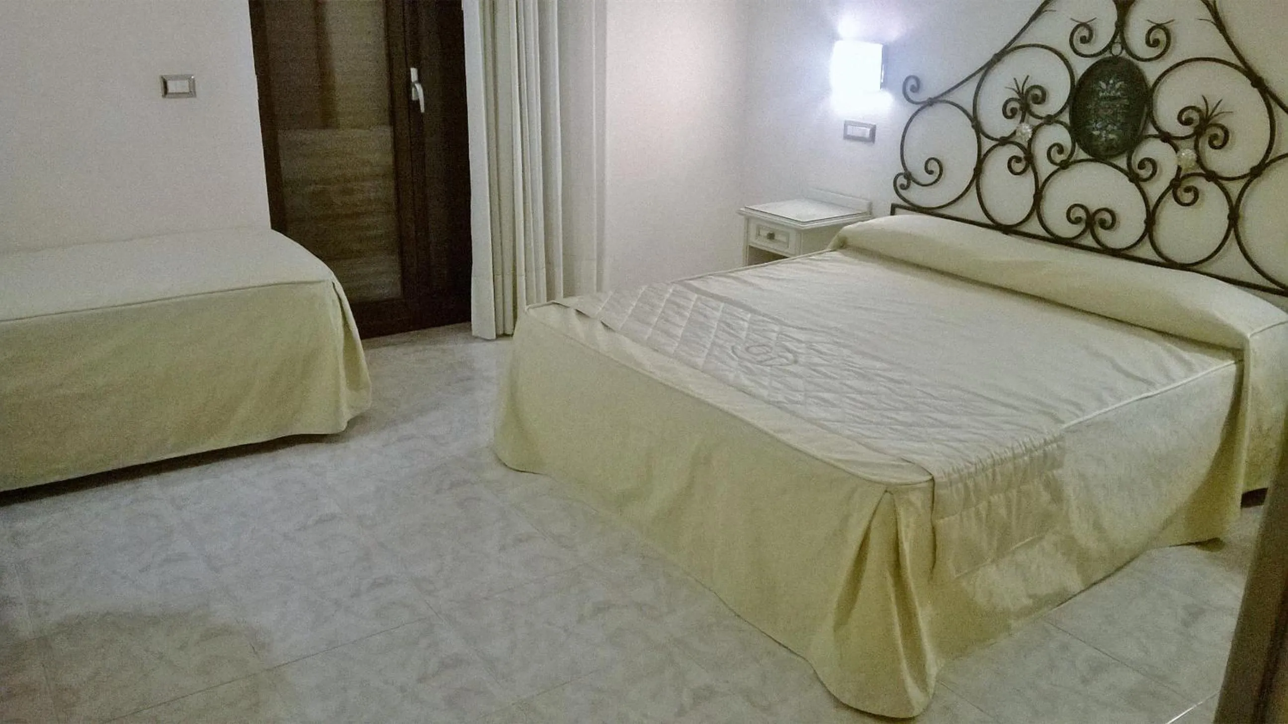 Decorative detail, Bed in Hotel Ginevra