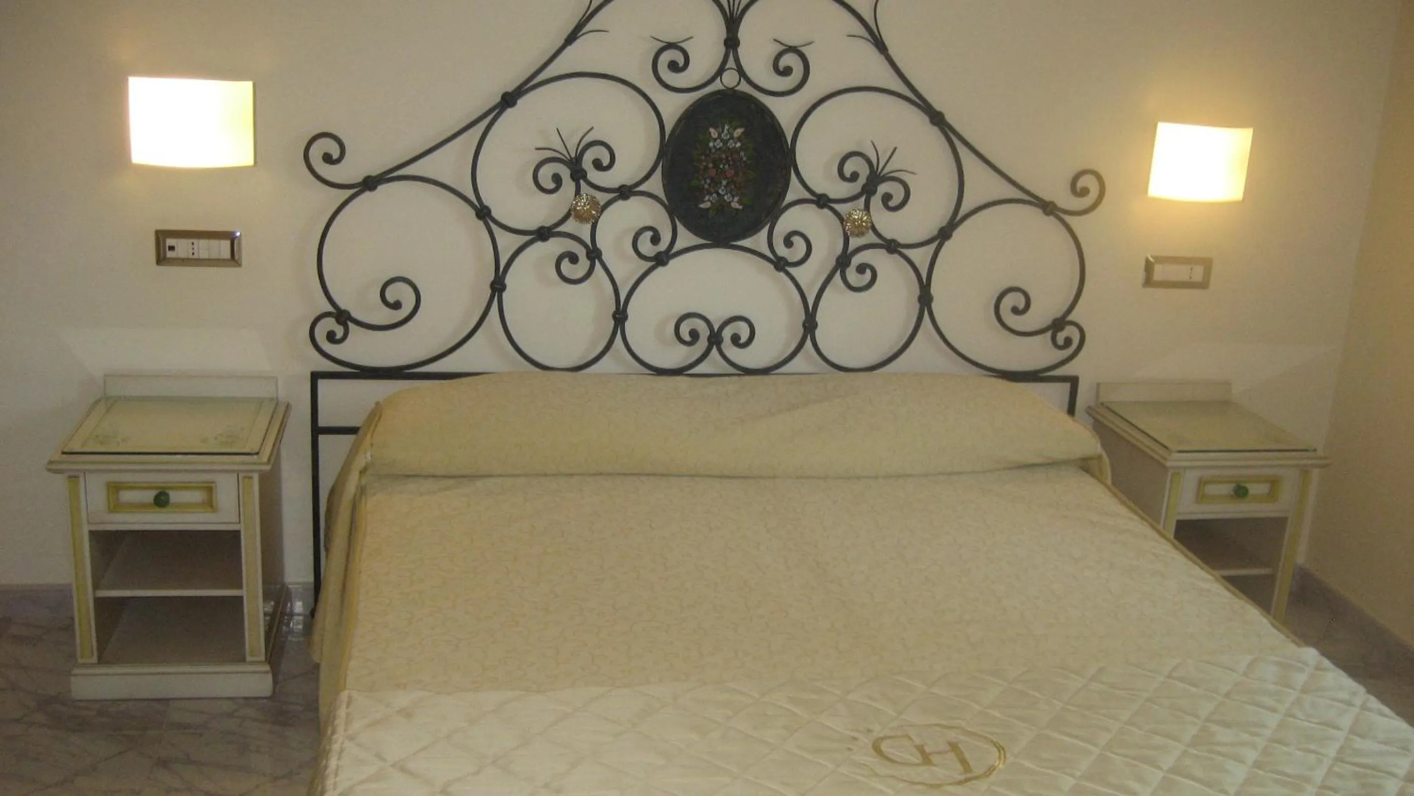 Decorative detail, Bed in Hotel Ginevra