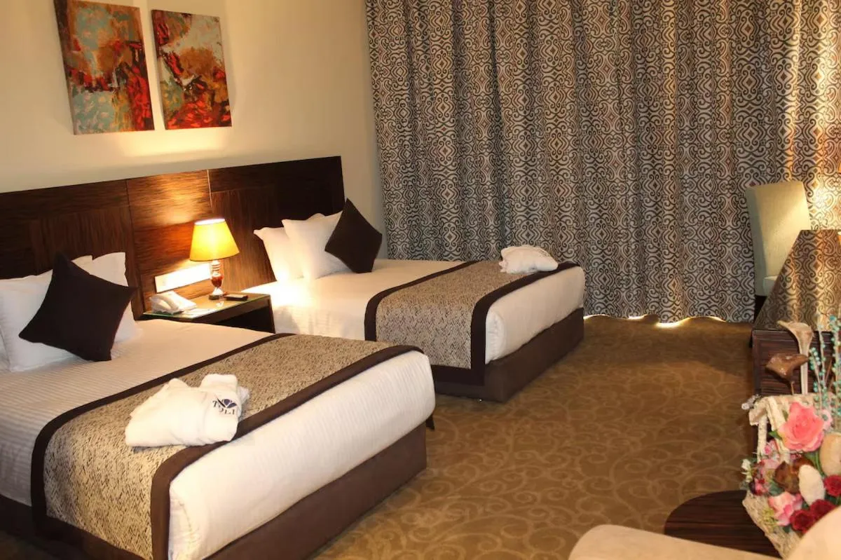 Bed in Tolip El Forsan Hotel