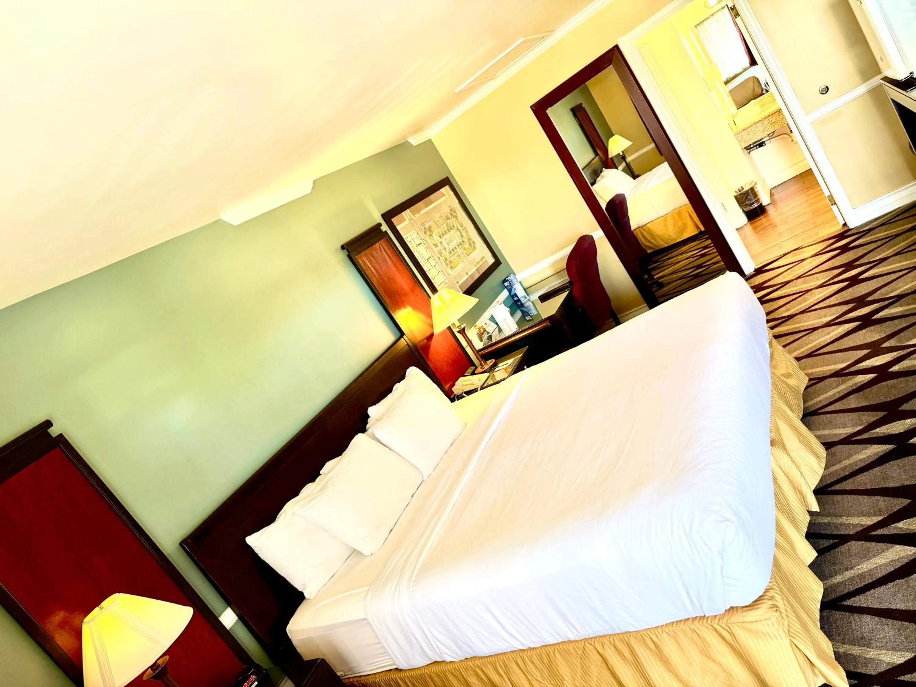 Bedroom, Bed in Clarion Inn Near China Lake Naval Station