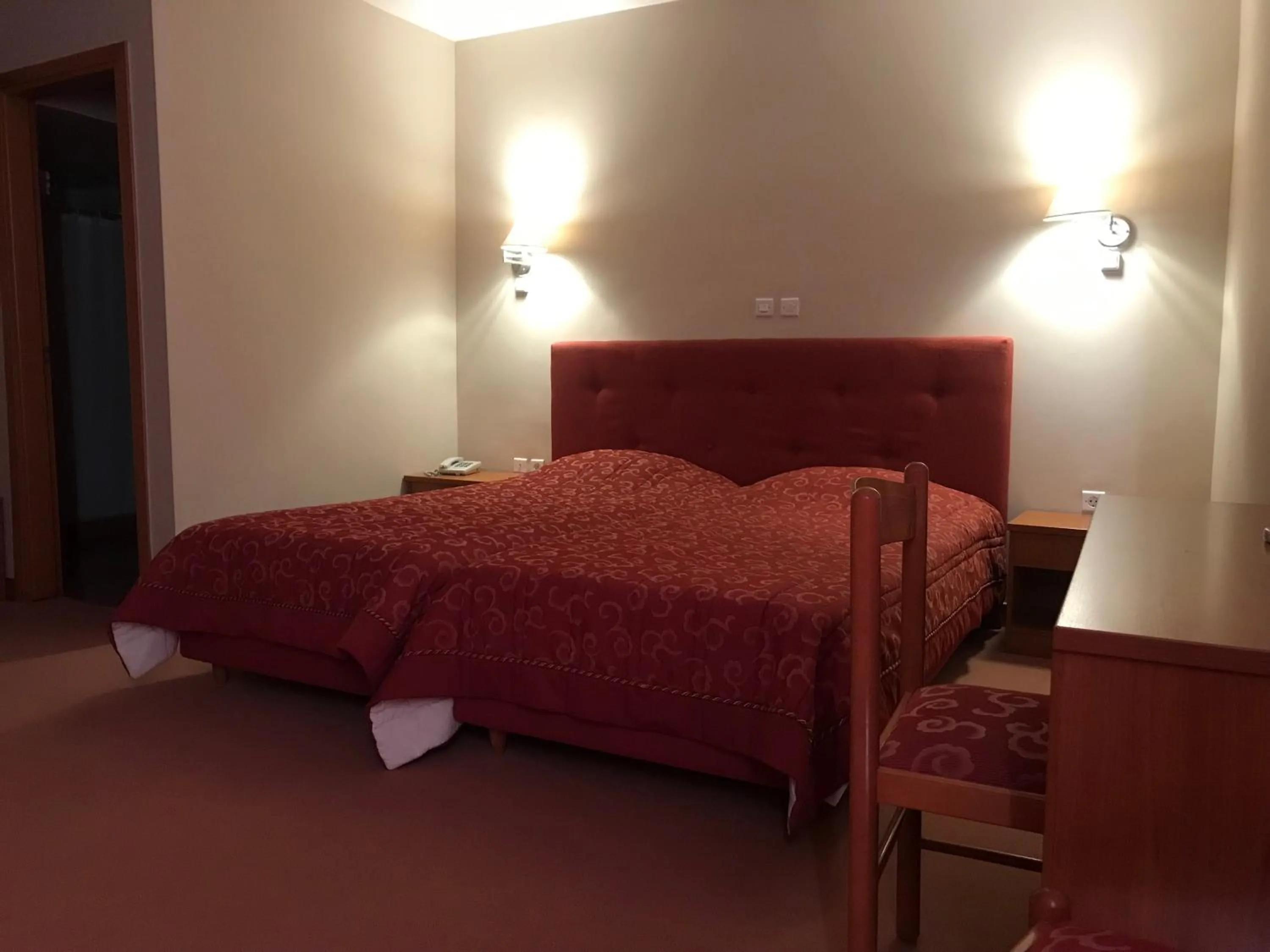 Photo of the whole room, Bed in Plaza Hotel