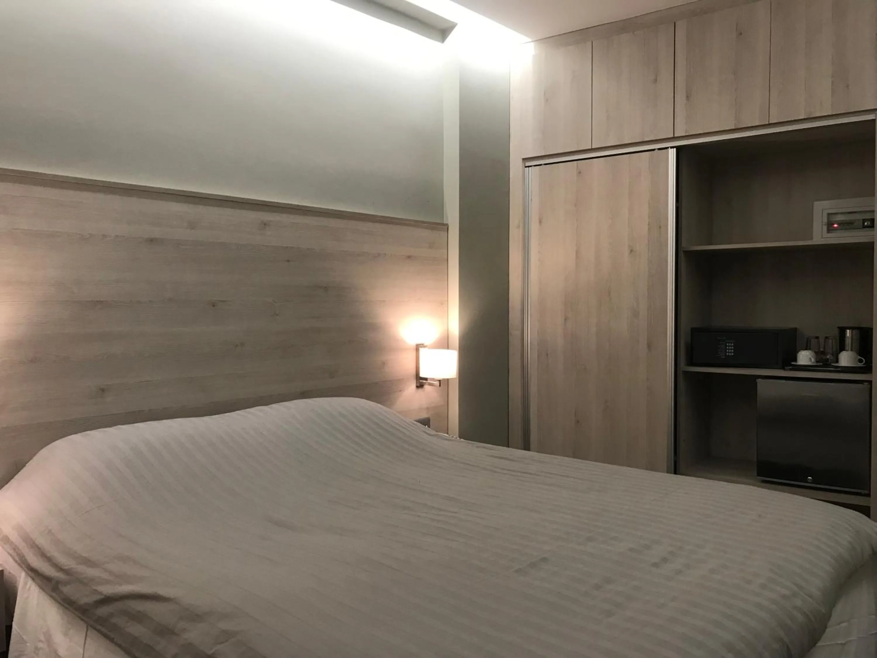 Photo of the whole room, Bed in Plaza Hotel