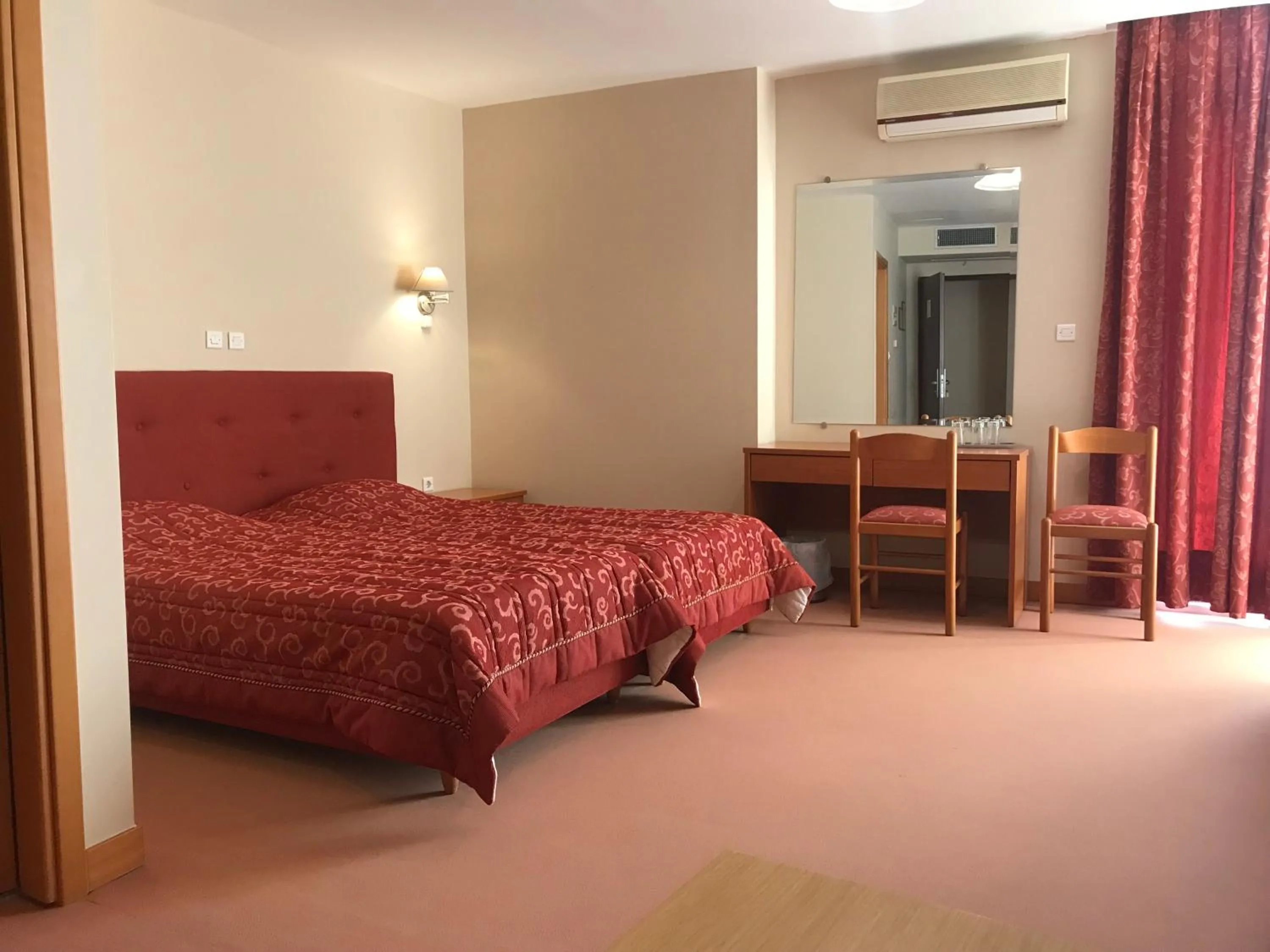 Photo of the whole room, Bed in Plaza Hotel