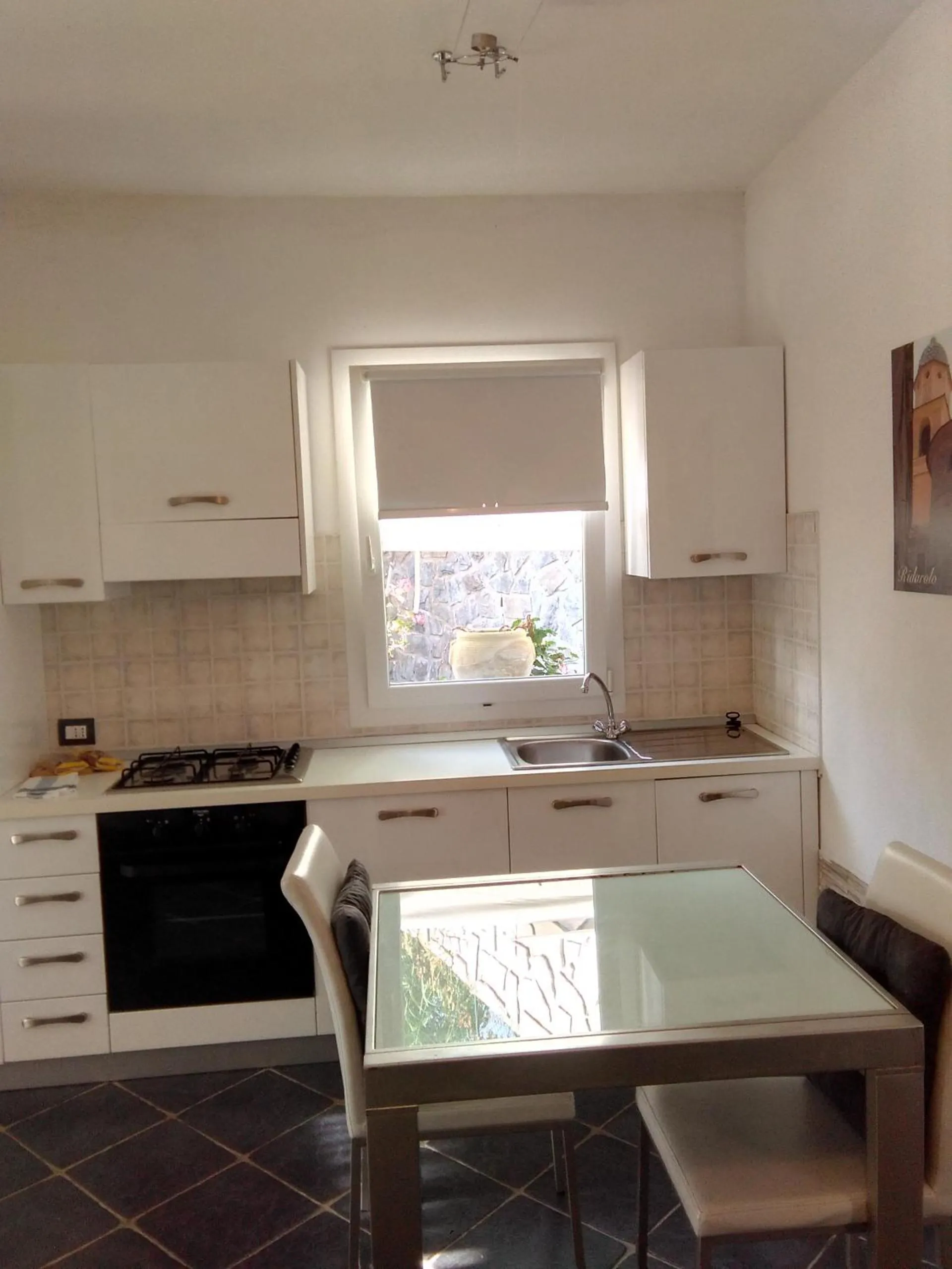 Kitchen or kitchenette in Costa Morroni