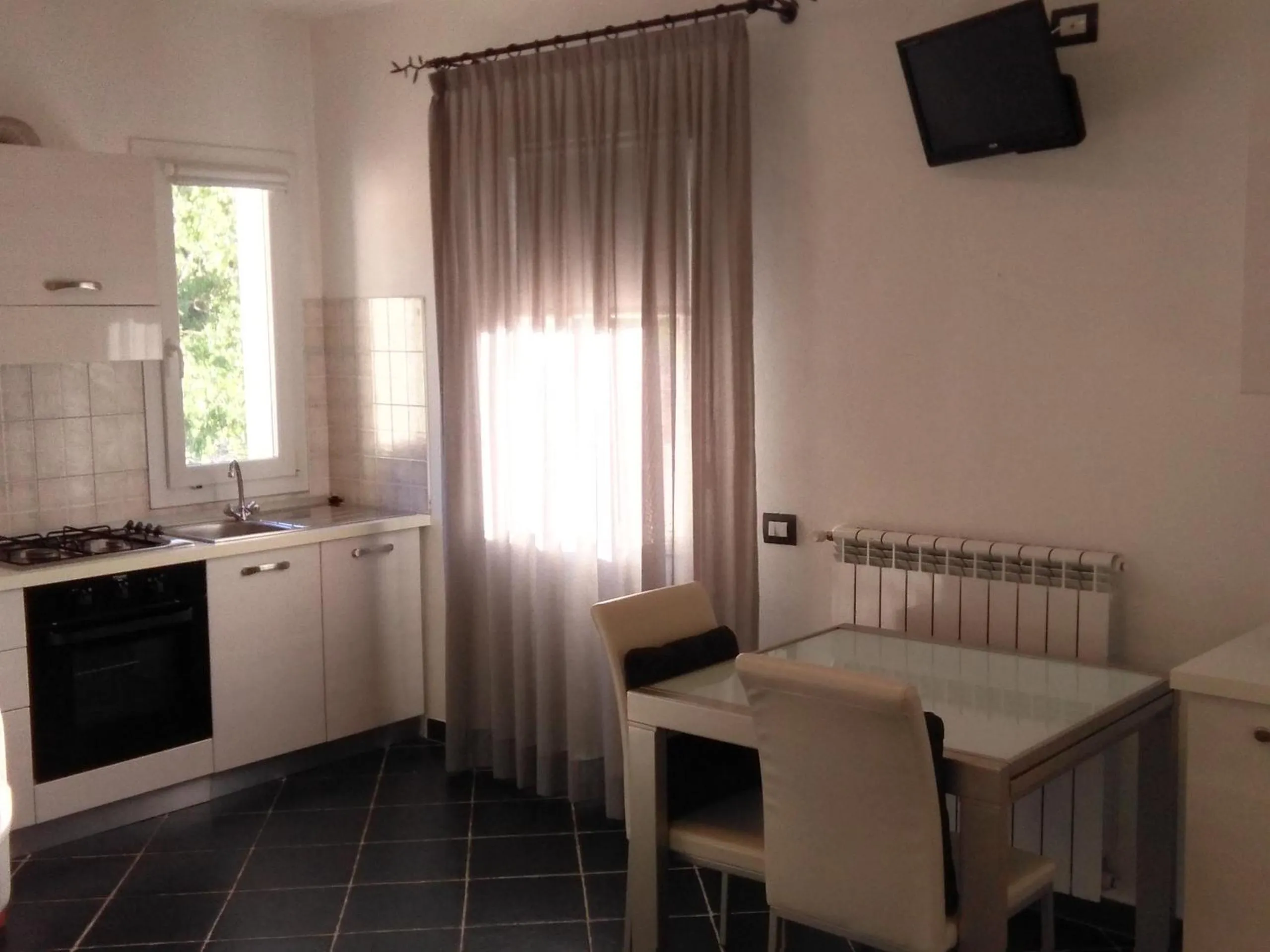 Kitchen or kitchenette in Costa Morroni