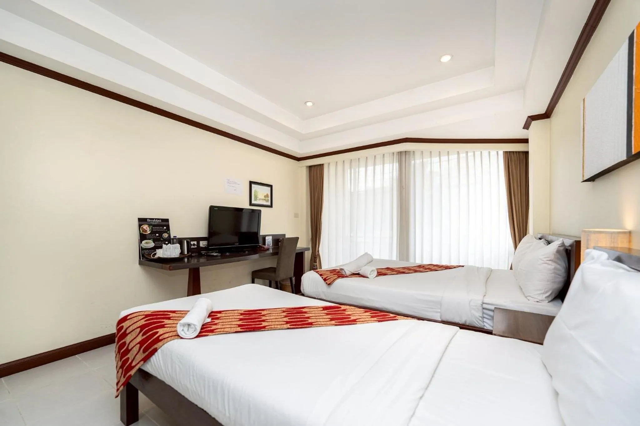 Bed in Khon Kaen Orchid Hotel