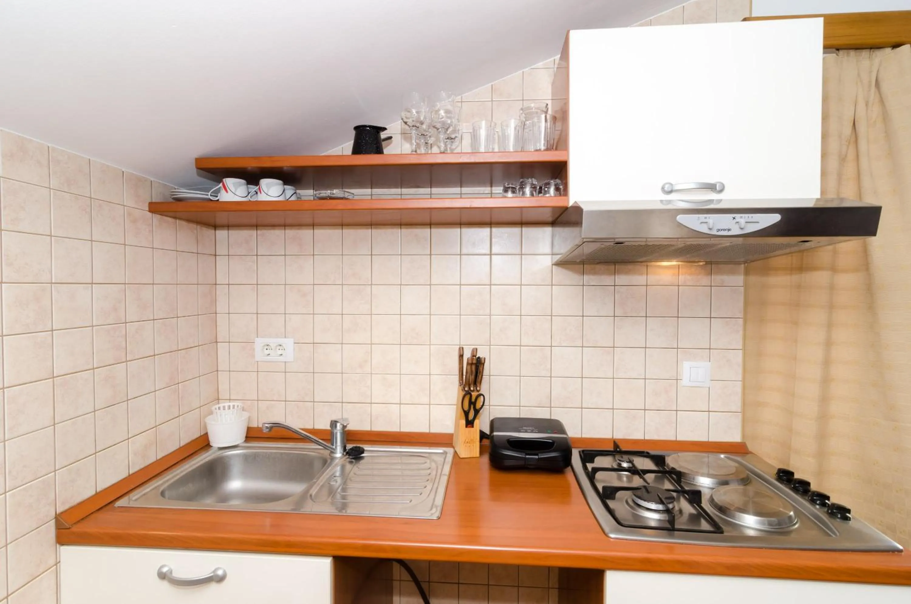 Kitchen or kitchenette in Apartments Senjo