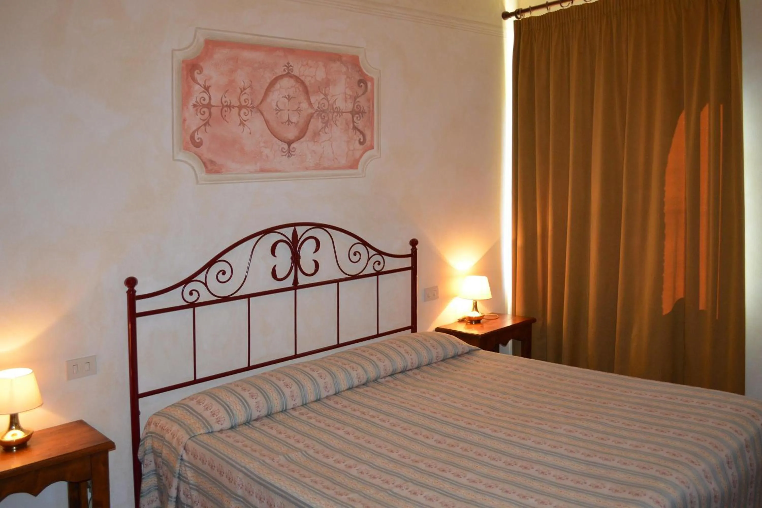 Photo of the whole room, Bed in Rocca degli Olivi
