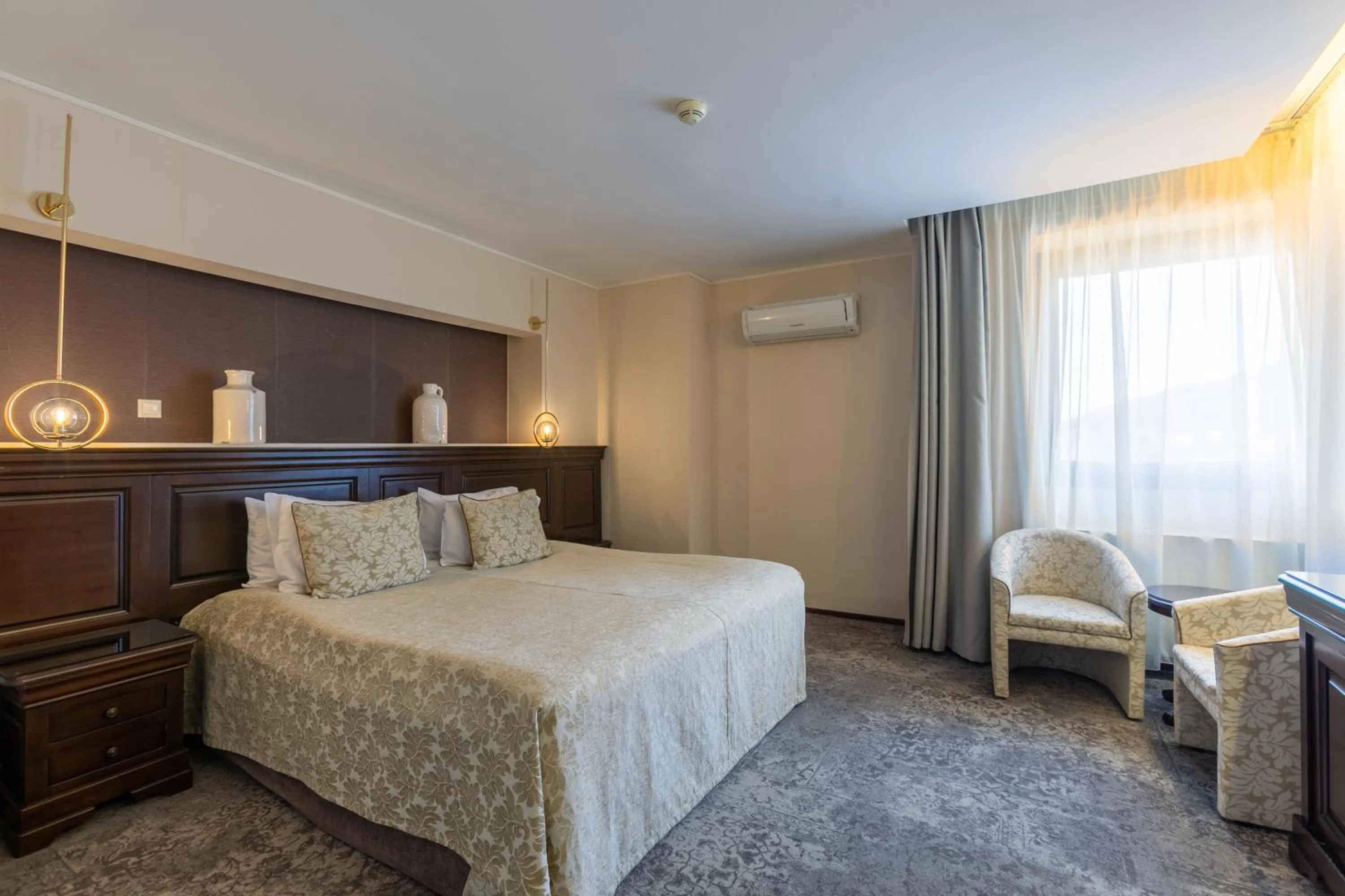 Bed in Alpin Resort Hotel